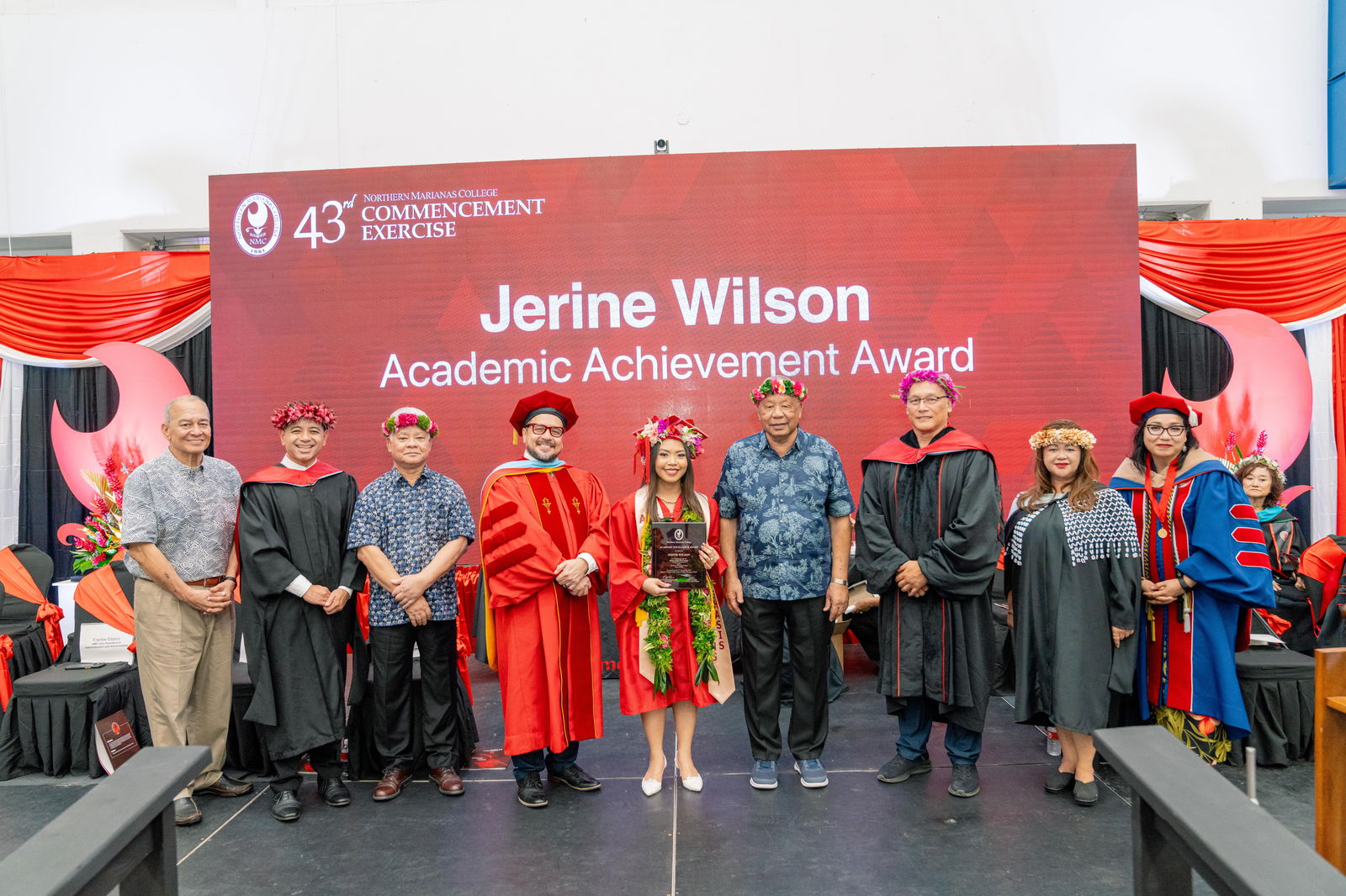Jerine Wilson, who graduated summa cum laude with an Associate of Applied Science in Business Administration, Accounting Emphasis, was honored with the Academic Excellence Award at Northern Marianas College’s 43rd Commencement Exercise on May 17, 2024, at the Marianas High School Gymnasium. Pictured with Wilson, from left, are keynote speaker U.S. Congressman Gregorio Kilili Camacho Sablan, NMC Vice President for Administration and Advancement Frankie Eliptico, CNMI Governor Arnold I. Palacios, NMC President Galvin Deleon Guerrero, EdD, CNMI Lt. Governor David M. Apatang, NMC Board of Regents Chair Charles Cepeda, NMC Dean of Student Support Services Charlotte Cepeda, and NMC Acting Dean of Academic Programs and Services Dr. Barbara Hunter.