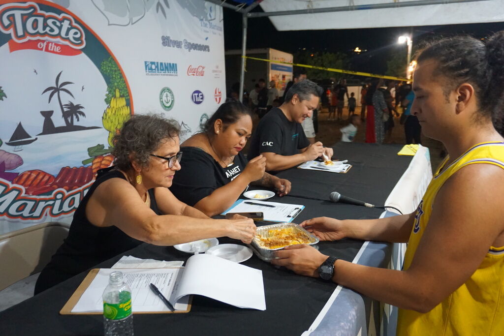 Judges sample one of the lantiyas prepared especially for the competition.