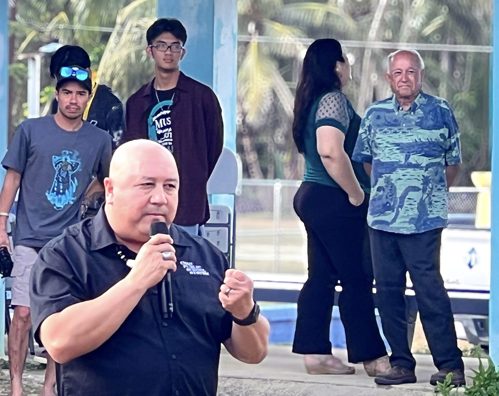 Commissioner of Education Dr. Lawrence F. Camacho urges Rota’s public school students to “continue learning and come back to serve the Rota community.” Also in photo: former Guam Gov. Carl T.C. Gutierrez, right, who is now the president and chief executive officer of the Guam Visitors Bureau.