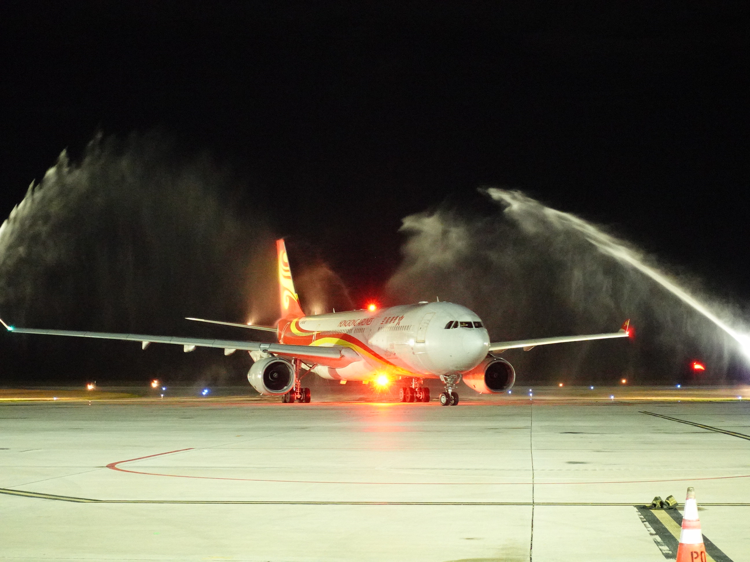Hong Kong Airlines is greeted with a water cannon salute upon arrival at Francisco C. Ada/Saipan International Airport in Saipan on April 29, 2024.