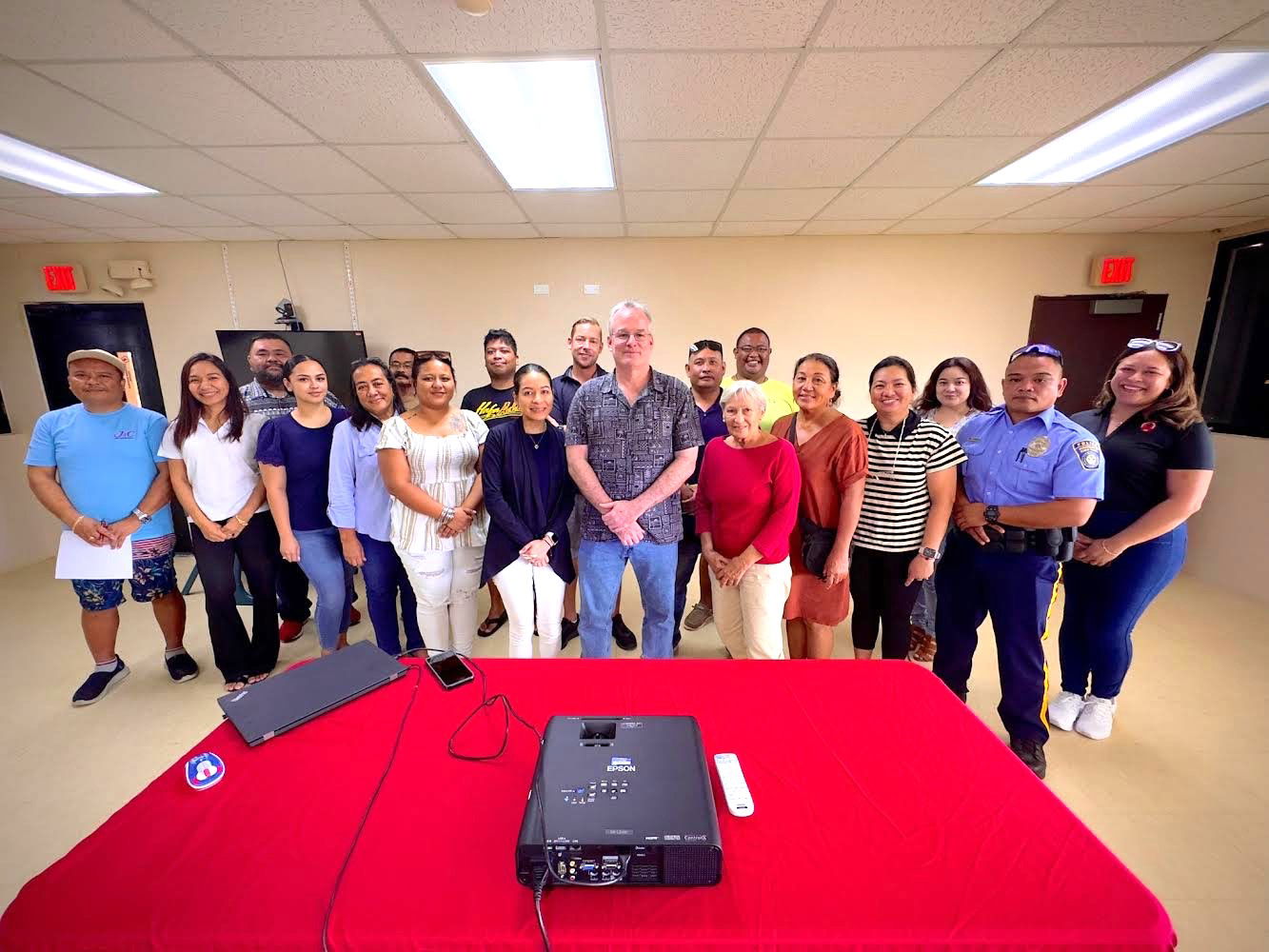 Training participants join Program Manager of the Guam APEX Accelerator Boris Hertslet and members of the CNMI SBDC team for a group photo.
