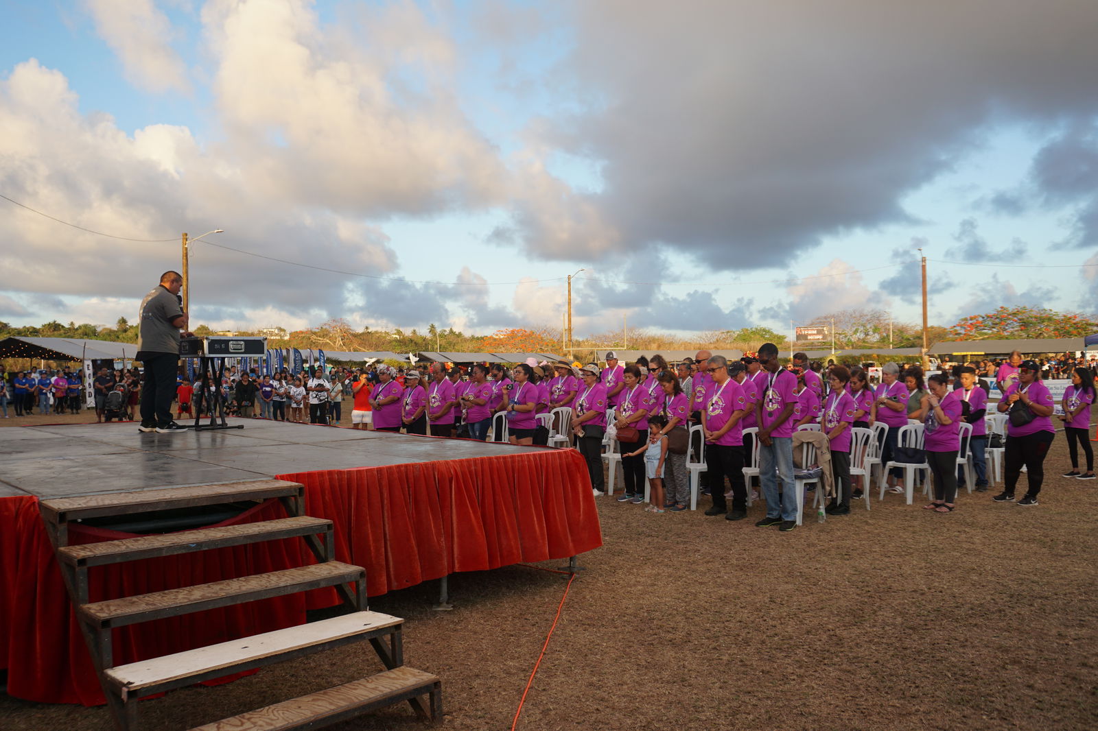 Father James Balajadia leads the invocation.