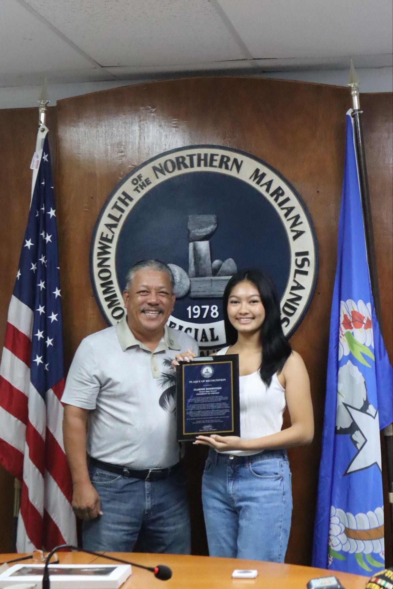 C/MAJ Clarize Rodriguez holds her plaque of recognition as she poses for a photo with Tinian Mayor Edwin Aldan.