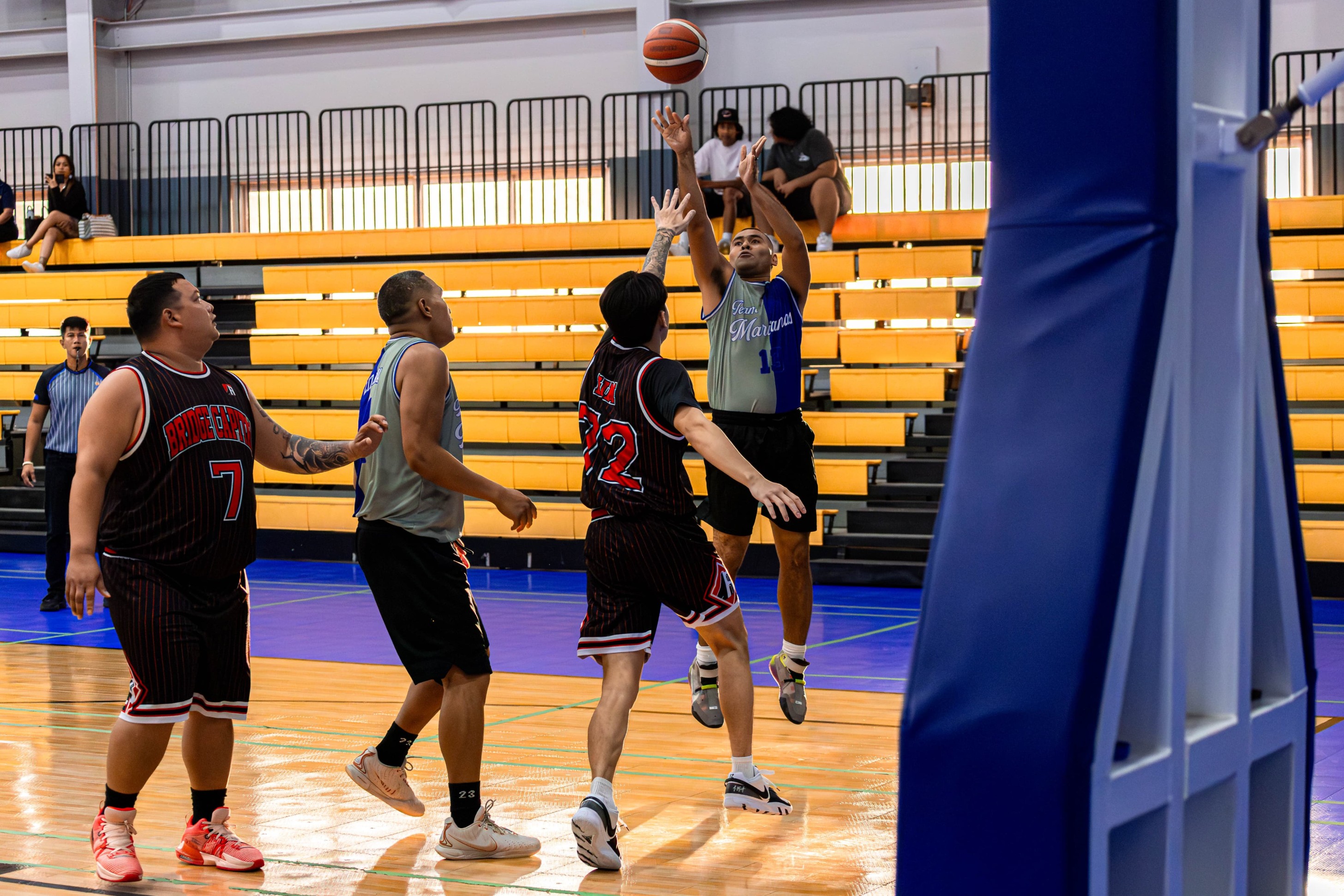 Team Marianas' Marvin Rabauliman pulls up for the corner jumper during a semifinal game against Bridge Capital in the Michelob Ultra Cup 2024 at the Ada gym on Wednesday.