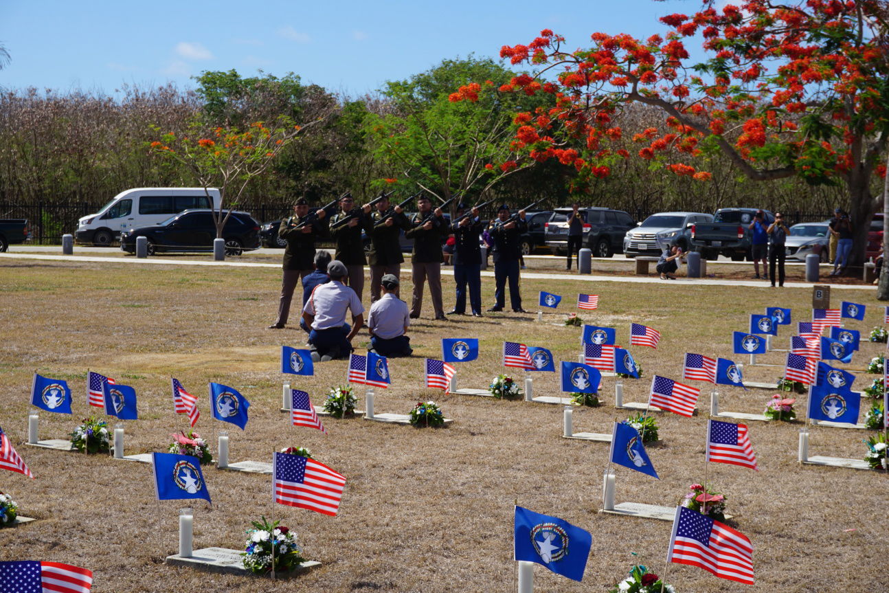 A 21-gun salute rings out in Marpi during a Memorial Day ceremony at the Veterans Cemetery on Monday.