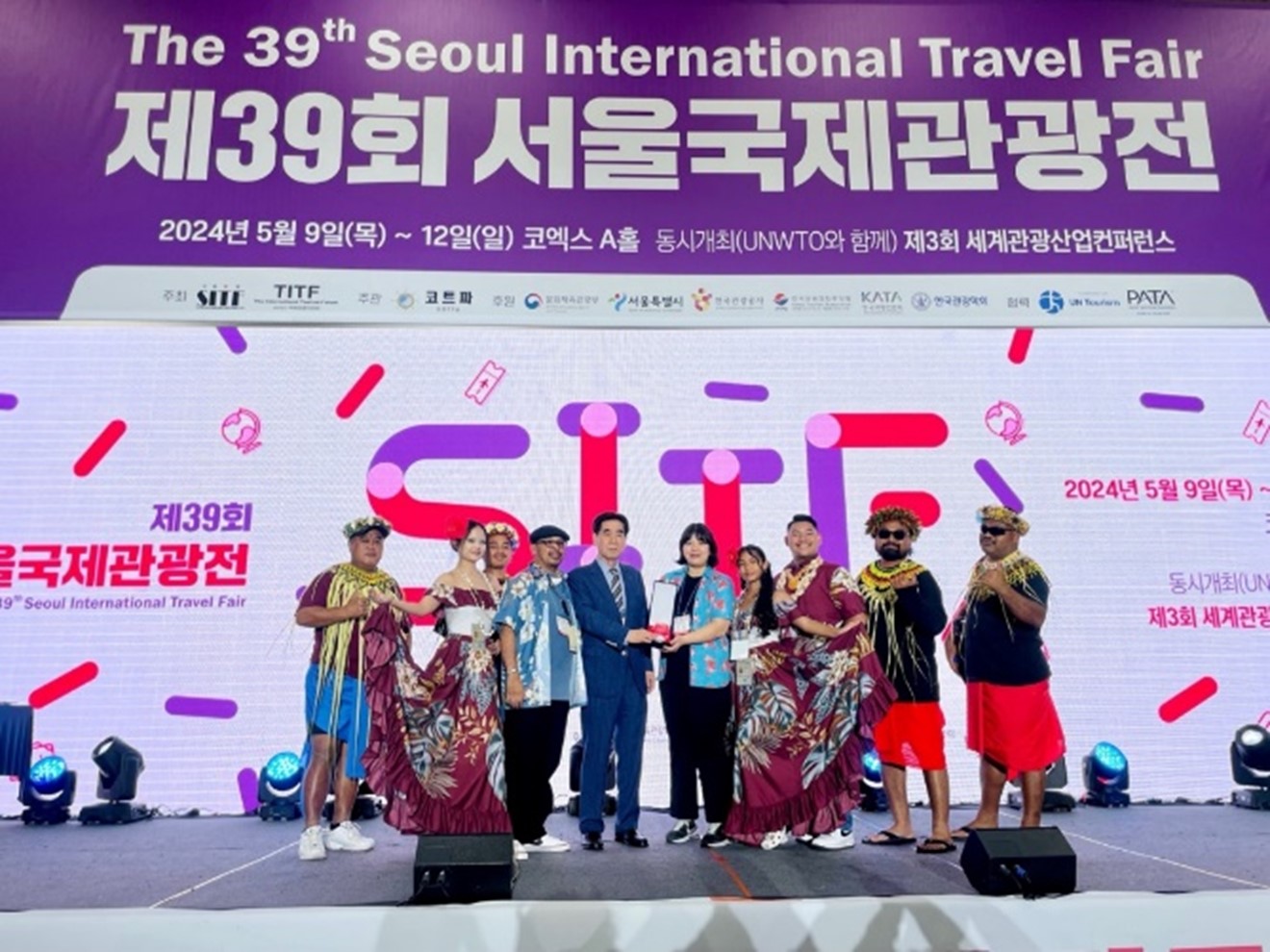 Delegates from the Marianas led by Marianas Visitors Authority Korea Business Development & Co-op Marketing Manager Sunny Jeong, fifth right, receive the award for “Most Popular Booth” at the 39th Seoul International Travel Fair held on May 9-12, 2024, at CODEX in Seoul, South Korea. The fair attracted 42,000 attendees and over 500 exhibitors.