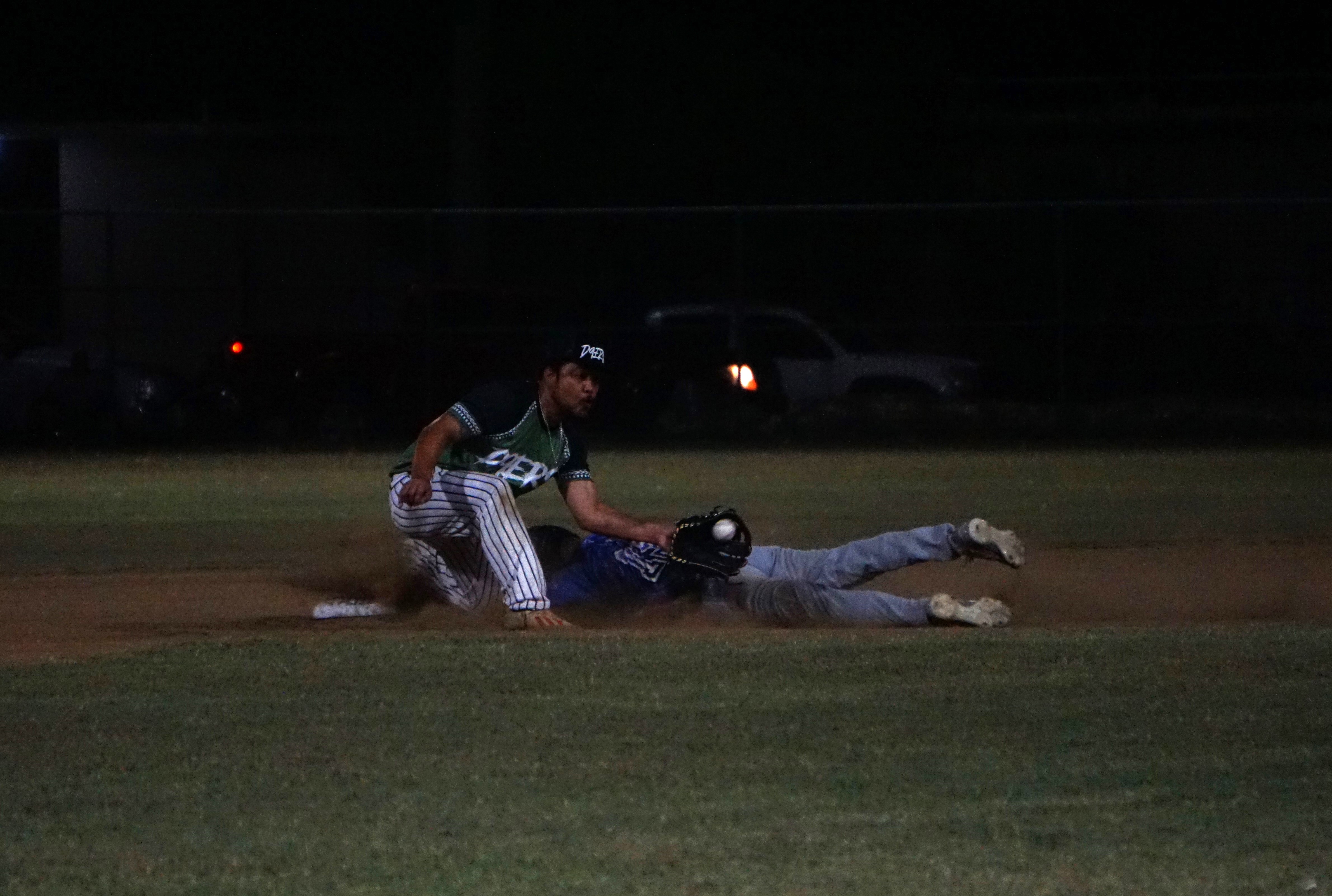 The Blue Jays' Alvin Takai beats the tag as he slides to second base during a 2024 Tan Holdings Saipan Baseball League game at the Francisco "Tan Ko" Palacios Baseball Field.