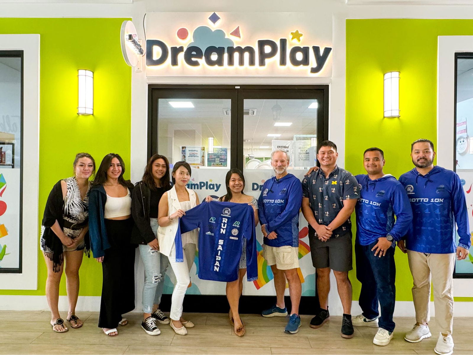 Representatives of the AP Group, including Partner & Managing Director Perry Inos, right, pose for a photo with Run Saipan President Edward Dela Cruz Jr. and Secretary/Treasurer Dr. Ron Snyder. The AP Group donated $500 to the 3rd annual Grotto 10K 2024, which will be held on Saturday, June 1.