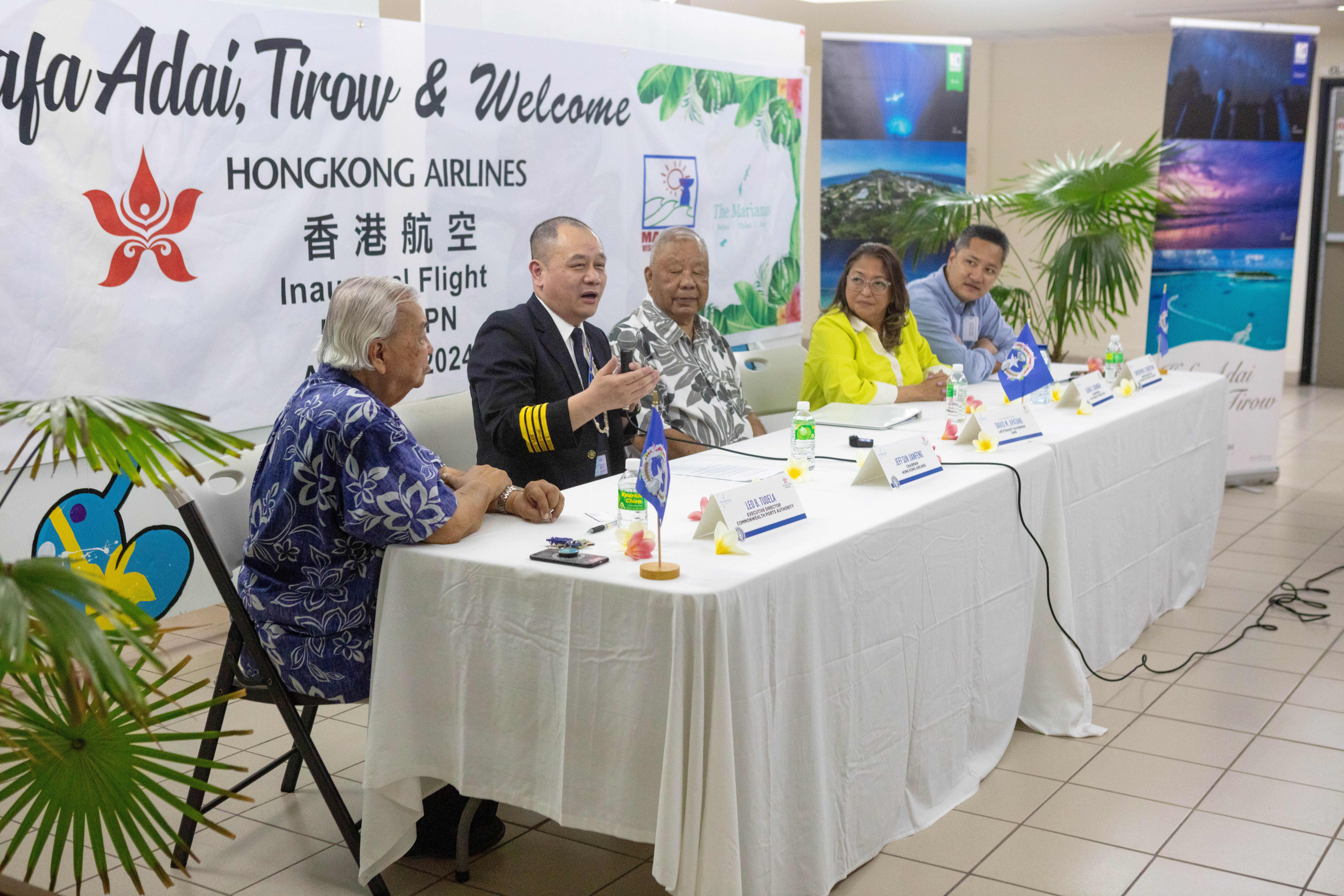 Hong Kong Airlines Chairman and flight pilot Jianfeng “Jeff” Sun speaks at a brief ceremony to mark the arrival of Hong Kong Airlines at Francisco C. Ada/Saipan International Airport in Saipan on April 29, 2024. From left, Commonwealth Ports Authority Executive Director Leo Tudela, Sun, Lt. Gov. David M. Apatang, Marianas Visitors Authority Board Chairwoman Gloria Cavanagh, and MVA Managing Director Christopher A. Concepcion.