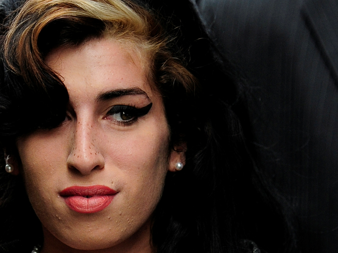 British singer Amy Winehouse arrives at Westminster Magistrates Court in central London, July 23, 2009.
