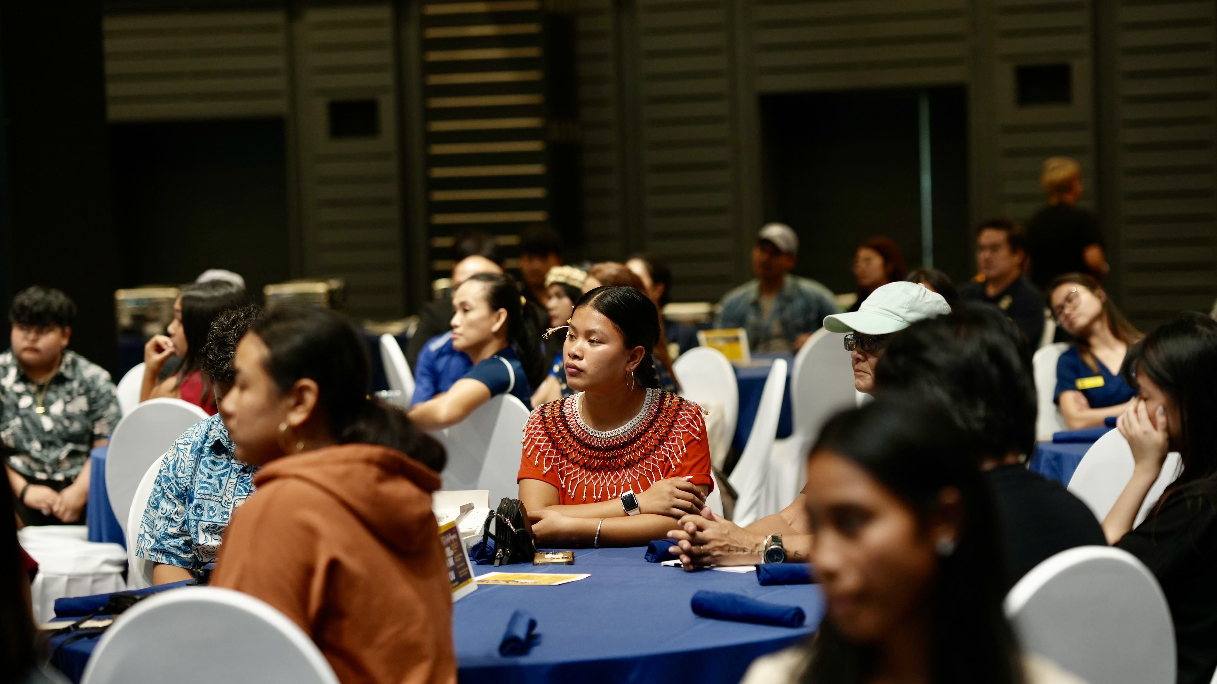 Public high school students who are part of the Spring 2024 Cooperative Education Internship Program listen to a speech.