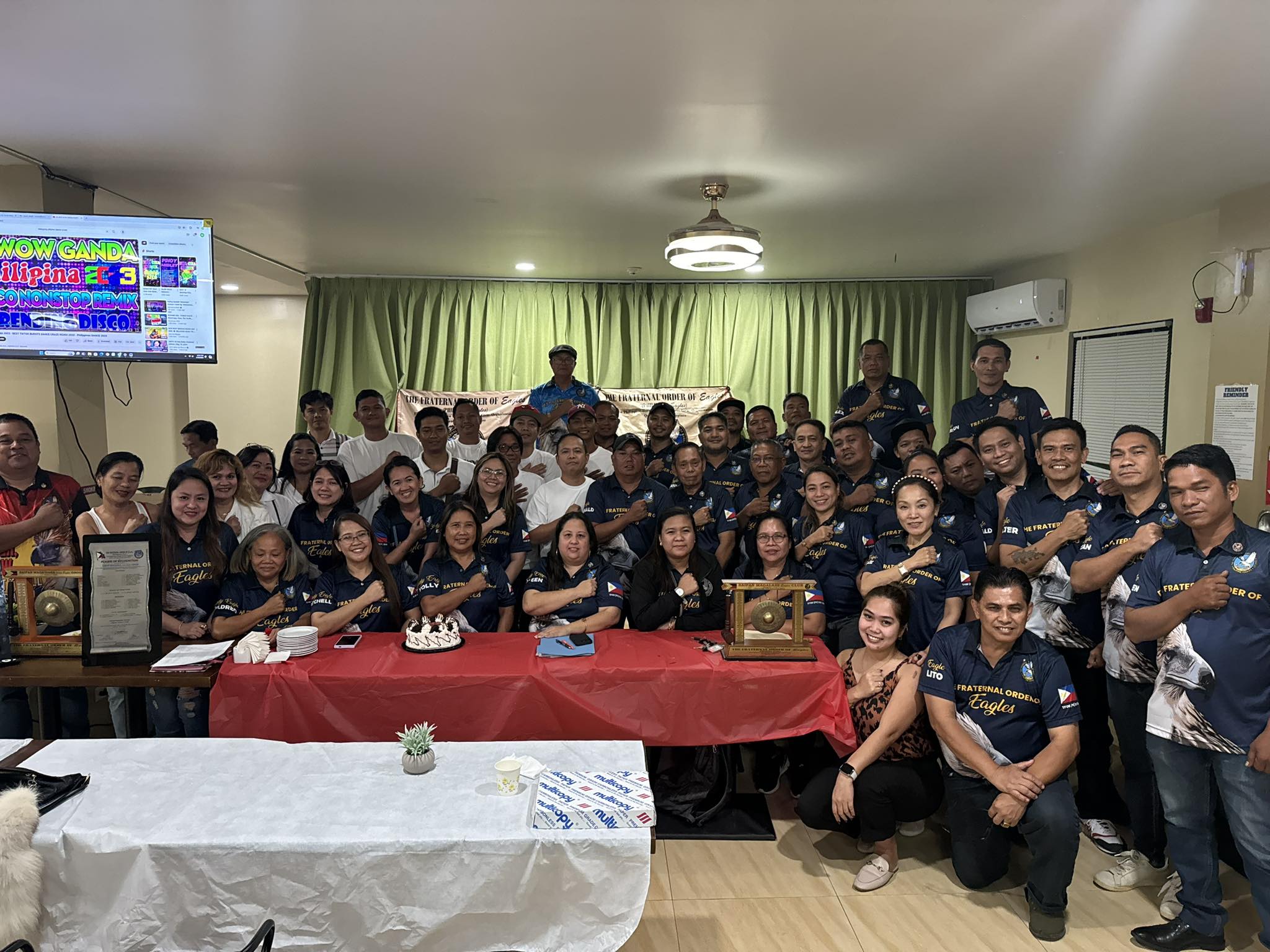 Members of the Saipan Maga’Haga Lady Eagles Club and the Saipan Magalahi Eagles Club pose for a photo during their meeting at Marvz Kitchen on May 18, 2024.