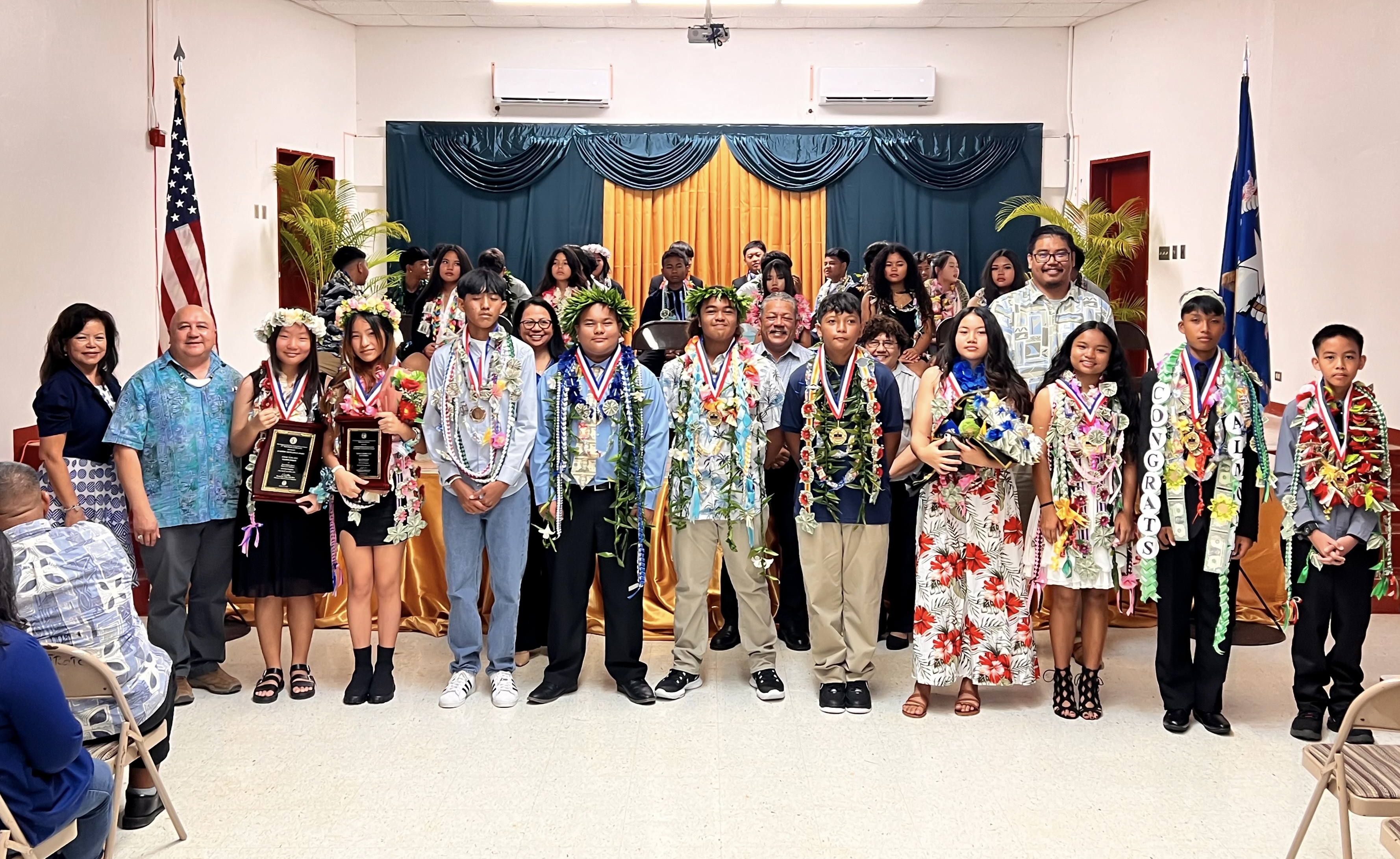 Tinian Middle School’s top 10 promoted eighth graders pose for a photo with Principal Liz Perzinski, Commissioner of Education Dr. Lawrence F. Camacho, Acting BOE Chair Maisie B. Tenorio and BOE member Antonio L. Borja to the Tinian. The top 10 are (1) Chae Yun Seo, (2) Tina Chang Chi, (3) Christofe Donald Dora Patio, (4) Nazario Aguon Borja Jr., (5) Kymani Flores Nabors, (6) Ken Joshua Cabrera Litulumar, (7) Aleckah Candice Anastacio and Ava Roxy Vihyel Ayuyu John, (9) Johndel Esmidella Almonte, and (10) Arturo Lopez Rivera III.