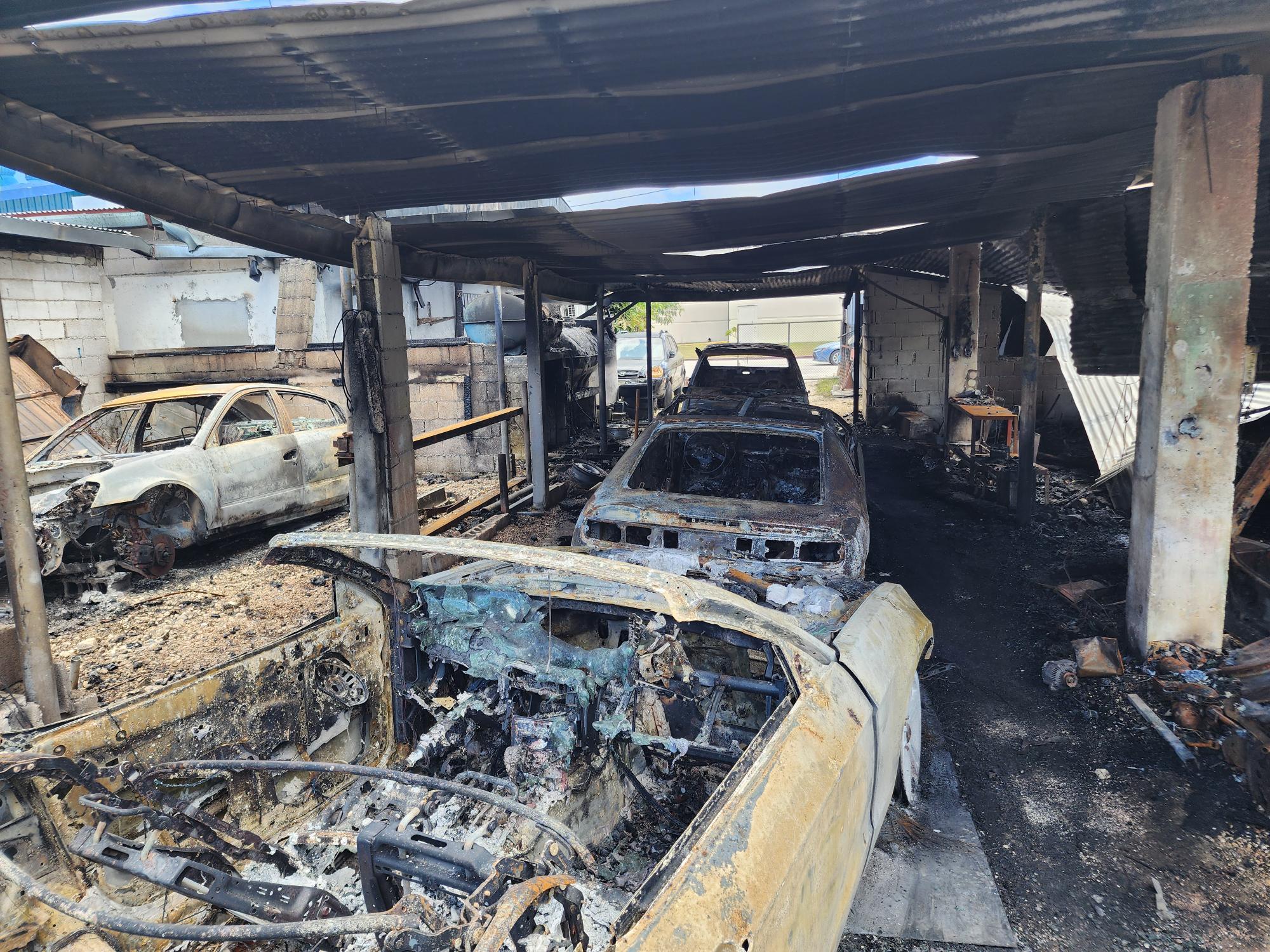 The vehicles at the ELS Auto Shop were ravaged by the fire.