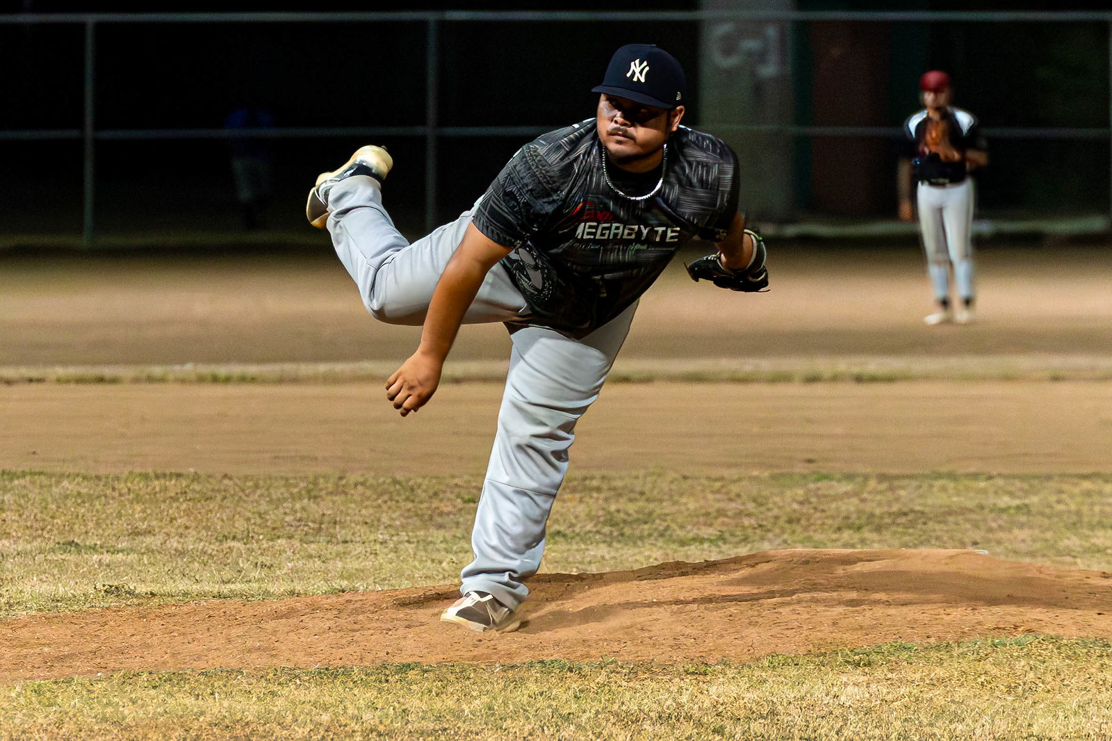 The Bandits' Jose Lizama pitches against the Blue Sharks during a game in the 2024 Tan Holdings Saipan Baseball League at the Francisco "Tan Ko" Palacios Baseball Field.