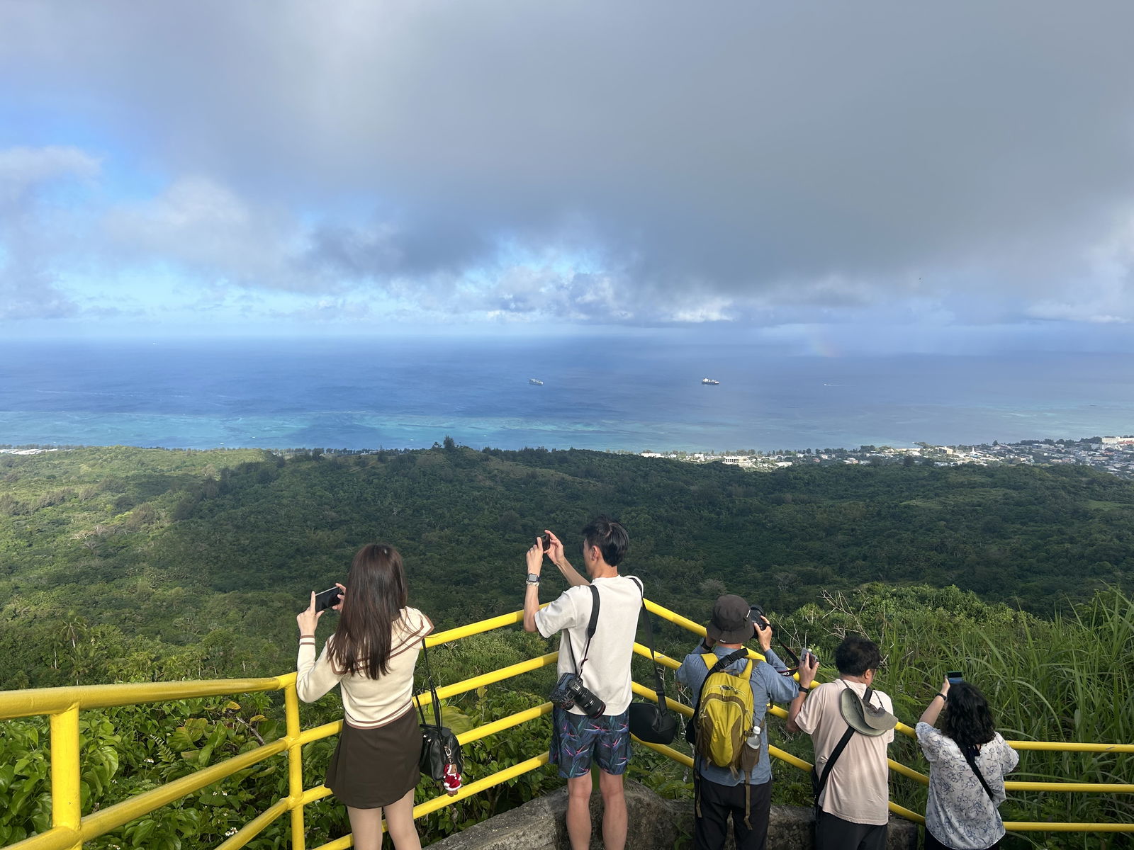 Representatives of eight Korean media outlets and their guides pay their respects at the Korean Memorial in Saipan.  The memorial commemorates those who lost their lives during World War II.  The media were in the Marianas to prepare news and entertainment coverage on the destination in coordination with the Marianas Visitors Authority.