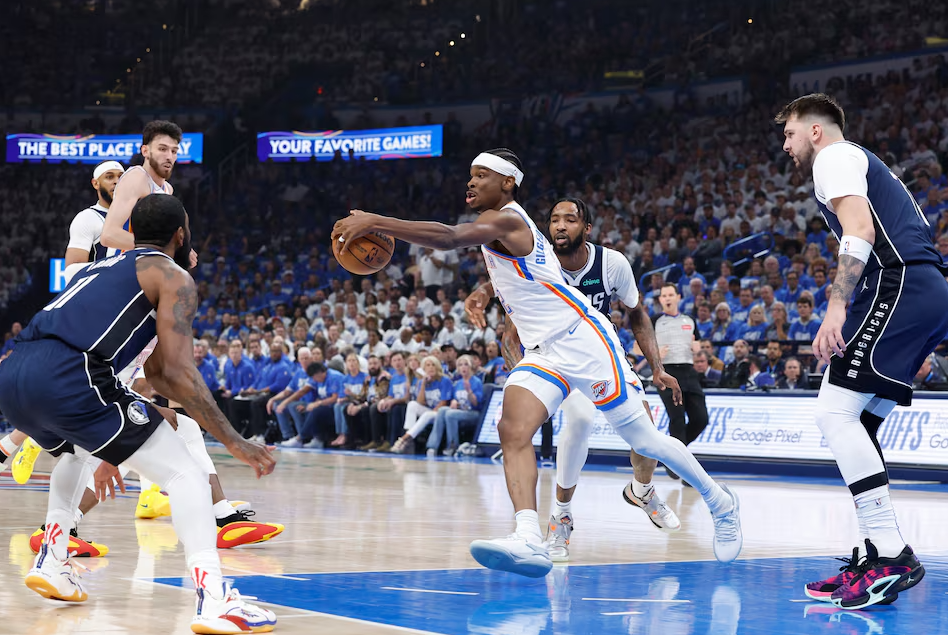 Oklahoma City Thunder guard Shai Gilgeous-Alexander (2) reaches for a loose ball on a play against the Dallas Mavericks during the first quarter of game one of the second round for the 2024 NBA playoffs at Paycom Center in Oklahoma City, Oklahoma, May 7, 2024.