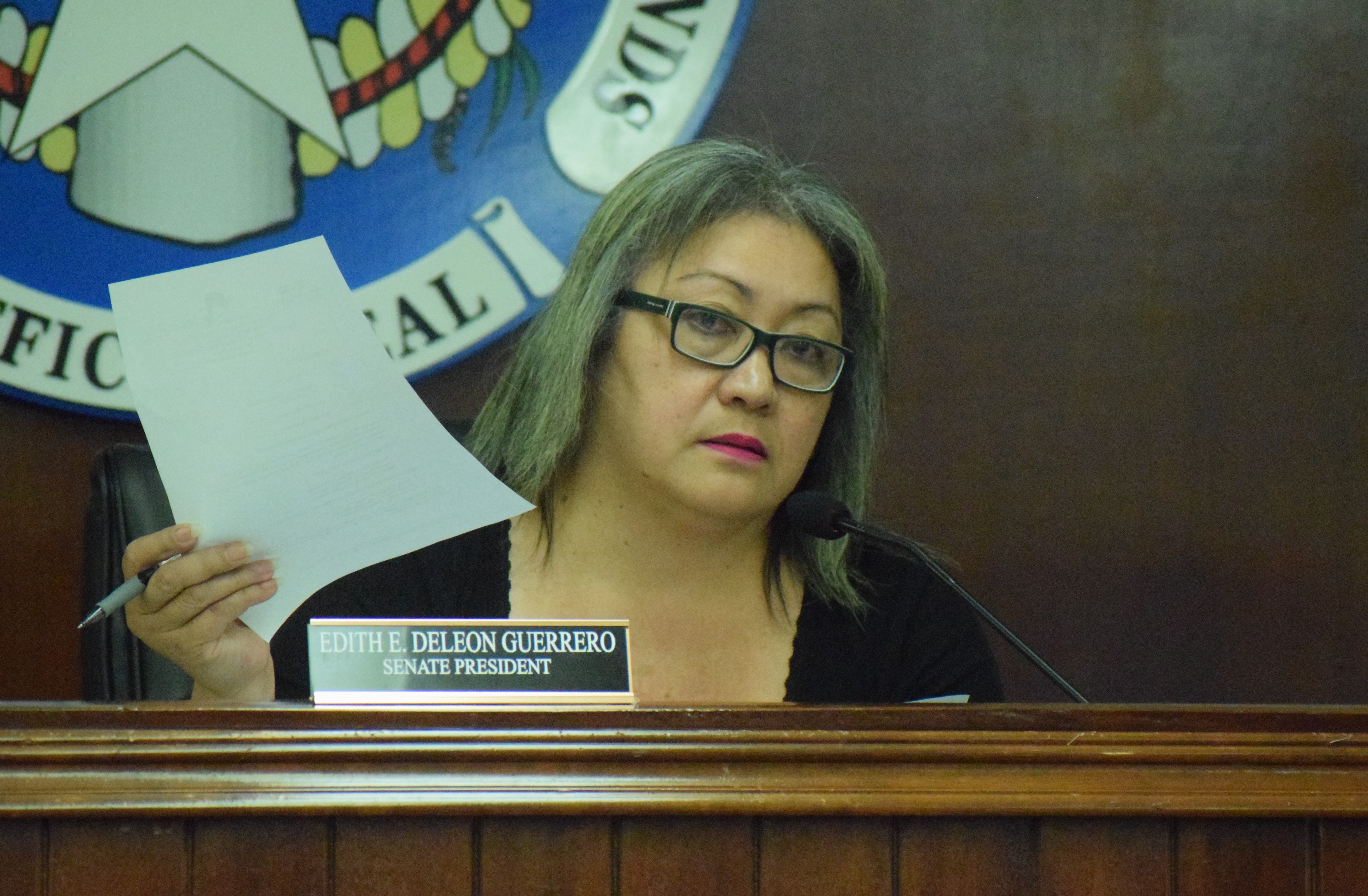 Senate President Edith Deleon Guerrero displays a copy of a document as she makes her remarks during the miscellaneous part of the Senate session on Monday.