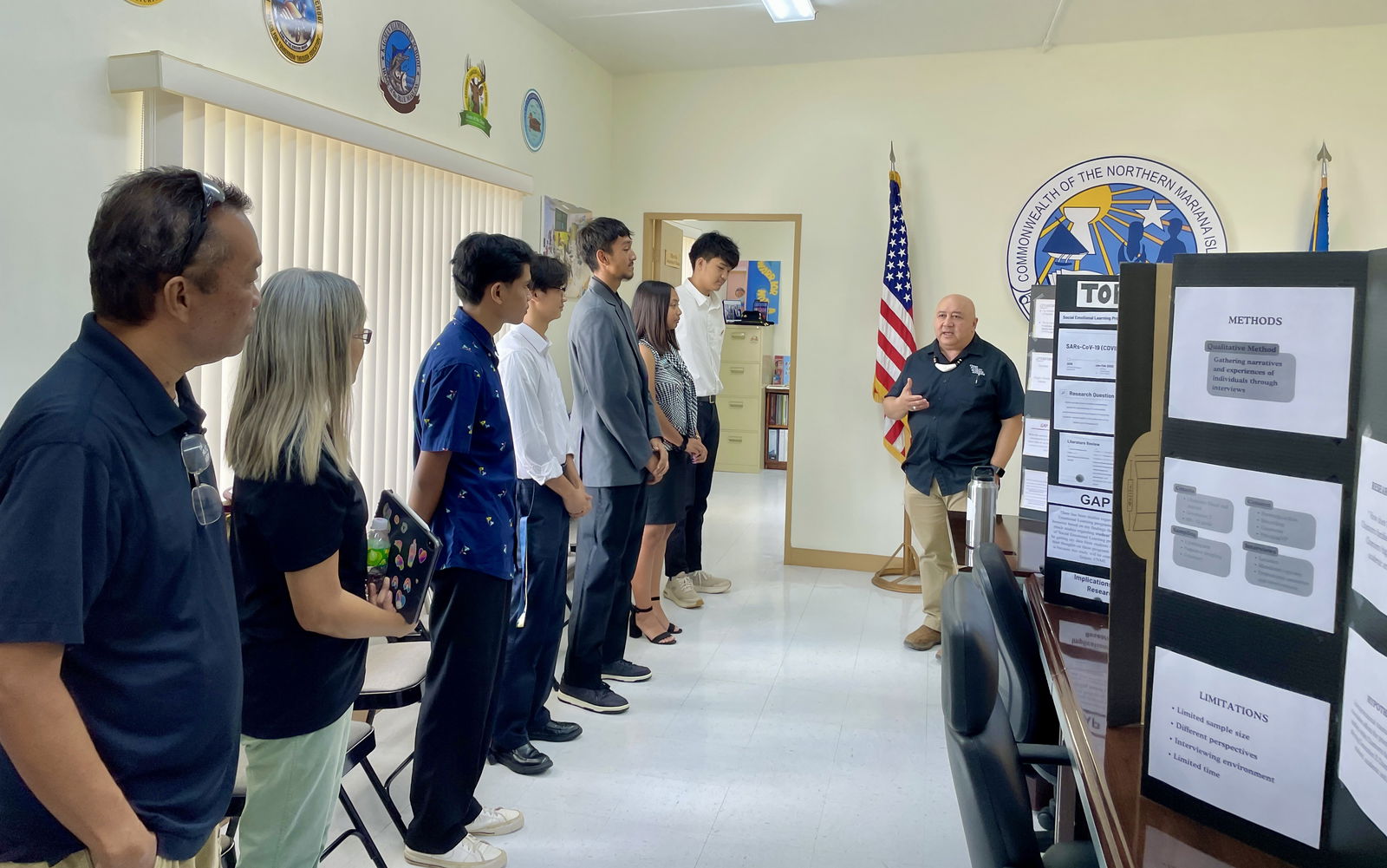 Commissioner of Education Dr. Lawrence F. Camacho speaks with the SSHS AP students and their advisers and school principal.