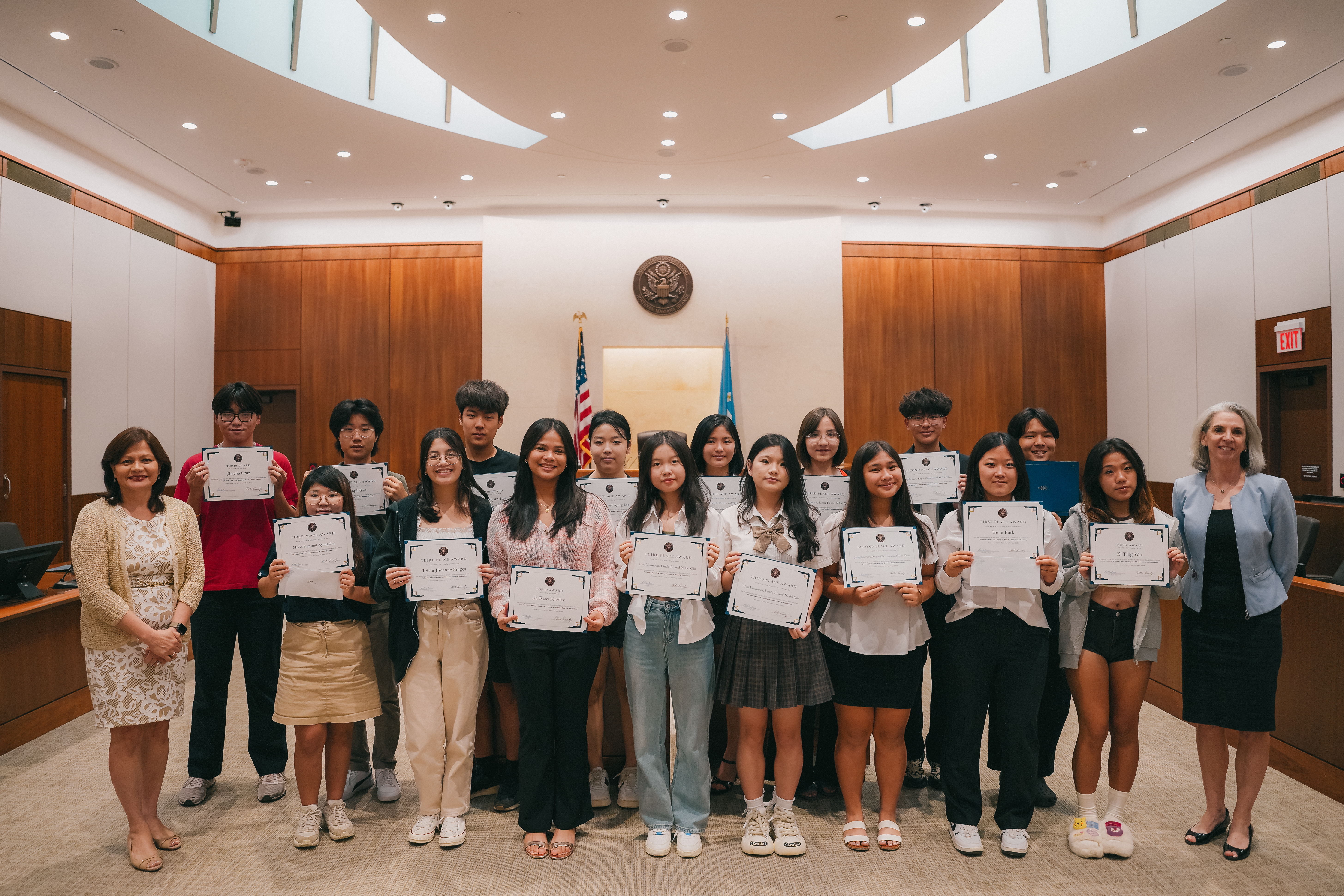 The awardees with Chief Judge Ramona V. Manglona and Magistrate Judge Heather L. Kennedy.