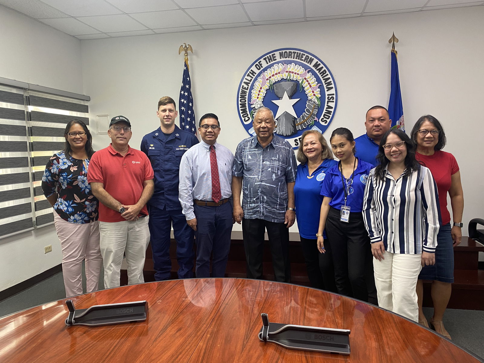 Office of Veterans Affairs staff and community members pose for a photo with Lt. Gov. David M. Apatang, who signed proclamation designating May 21 to 26 as Memorial Week.