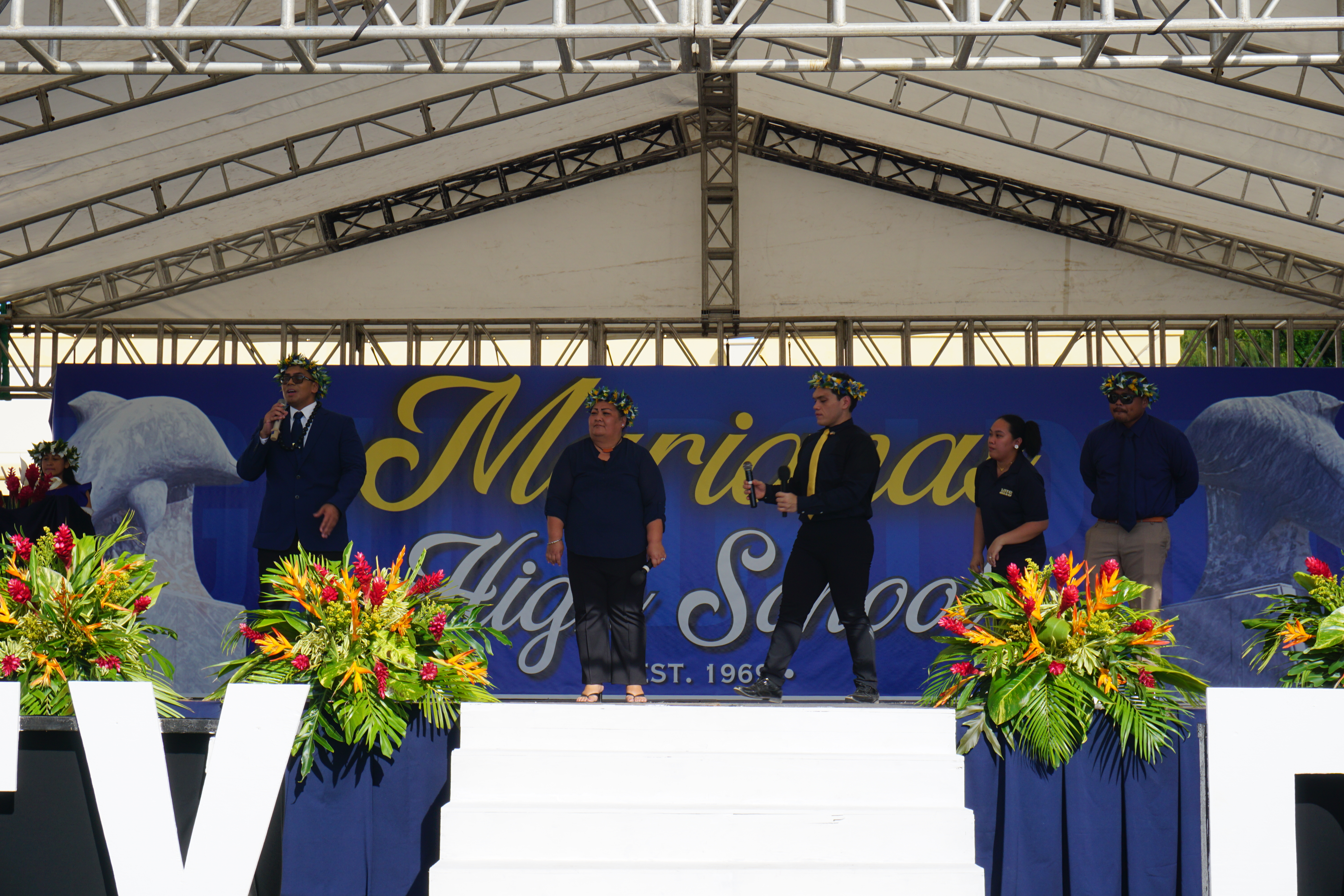 MHS Principal Jonathan Aguon, far left.