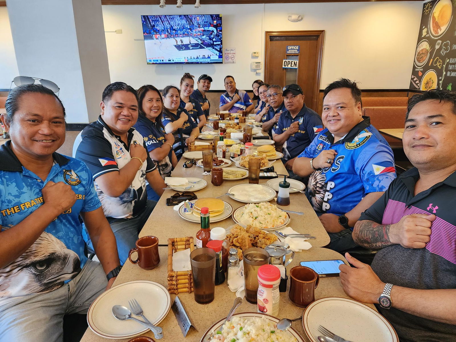 Fraternal Order of Eagles officials from the Philippines, Angelito “Jing” Cadiz and Augusto “Jhun” Cadiz Jr., pose for a photo with the Saipan eagles at Shirley’s Restaurant in Susupe on Thursday morning.