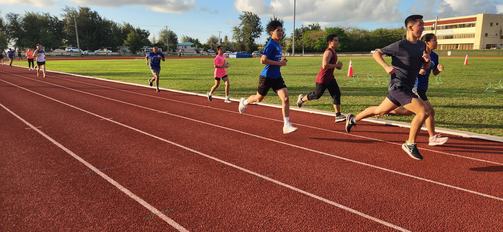 Students take on the 1-Mile Challenge during the celebration of Kids Athletics Day hosted by the Northern Marinas Athletics.