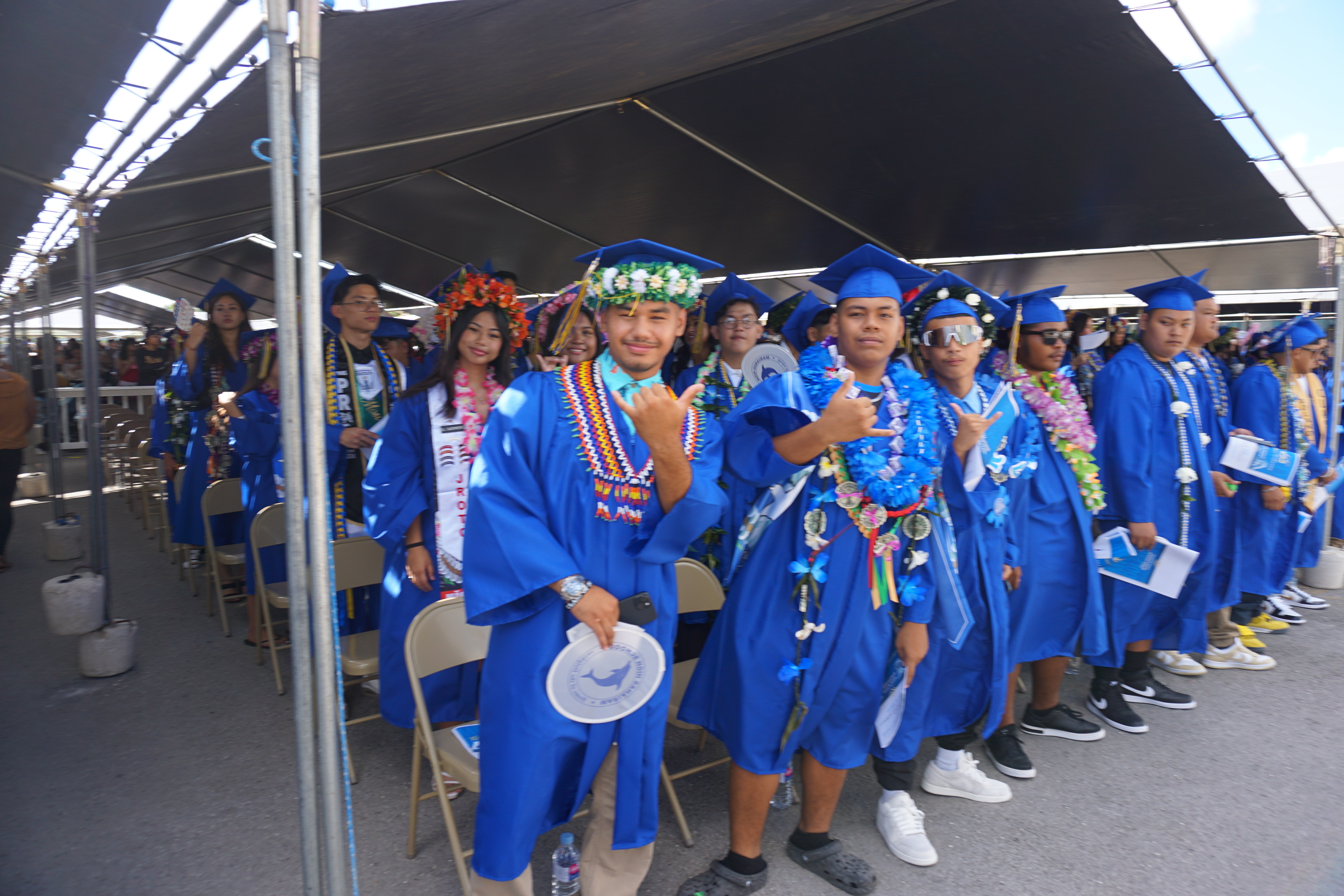 MHS graduates pose for a photo.