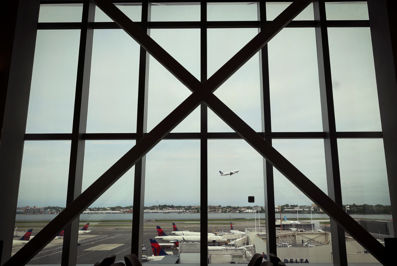 A plane takes off as seen from inside the newly completed 1.3 million-square foot $4 billion Delta Airlines Terminal C at LaGuardia Airport in the Queens borough of New York City, New York, U.S., June 1, 2022. 