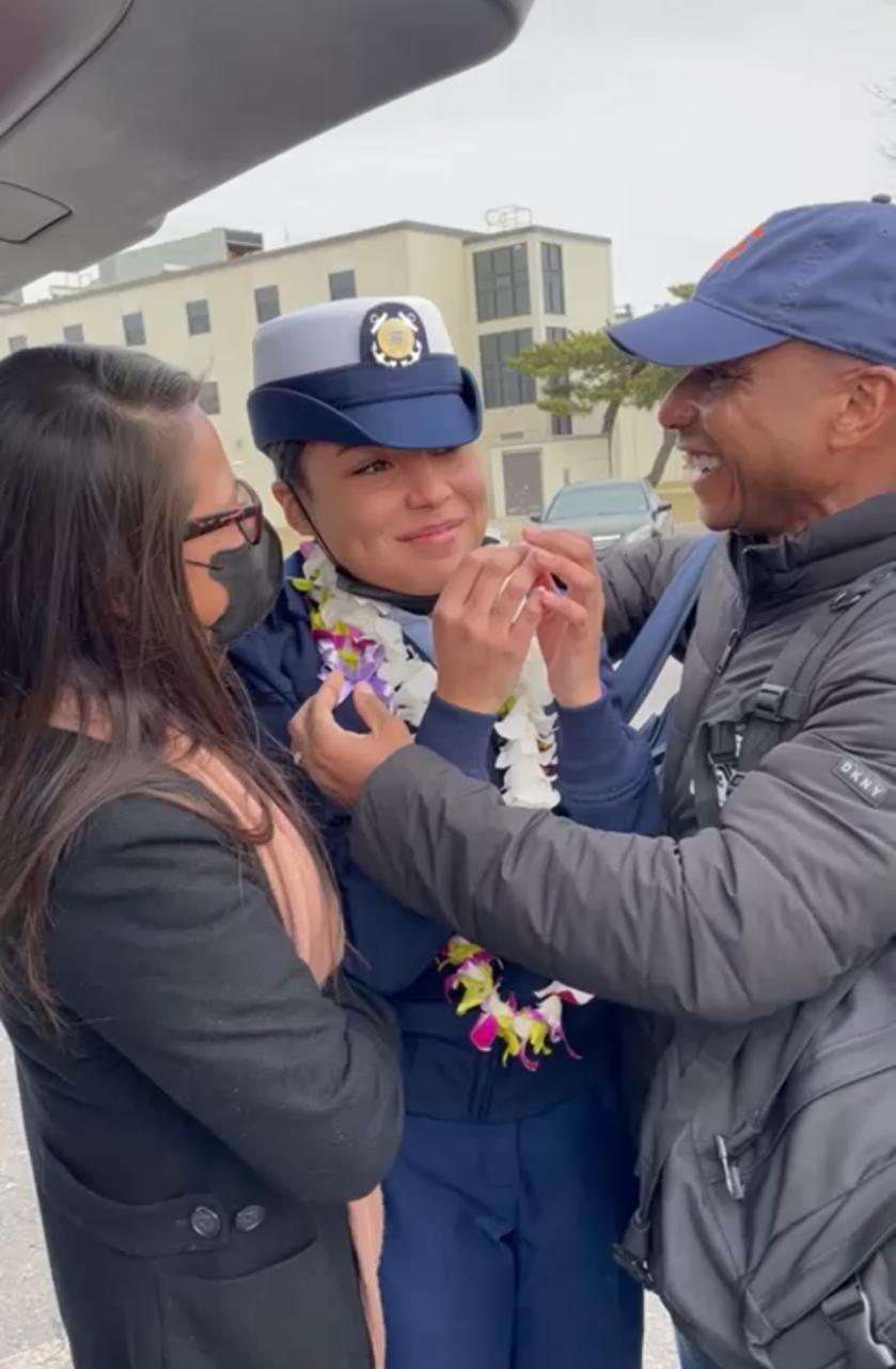 With husband Chester Hinds and daughter Sydney at her Coast Guard graduation ceremony.