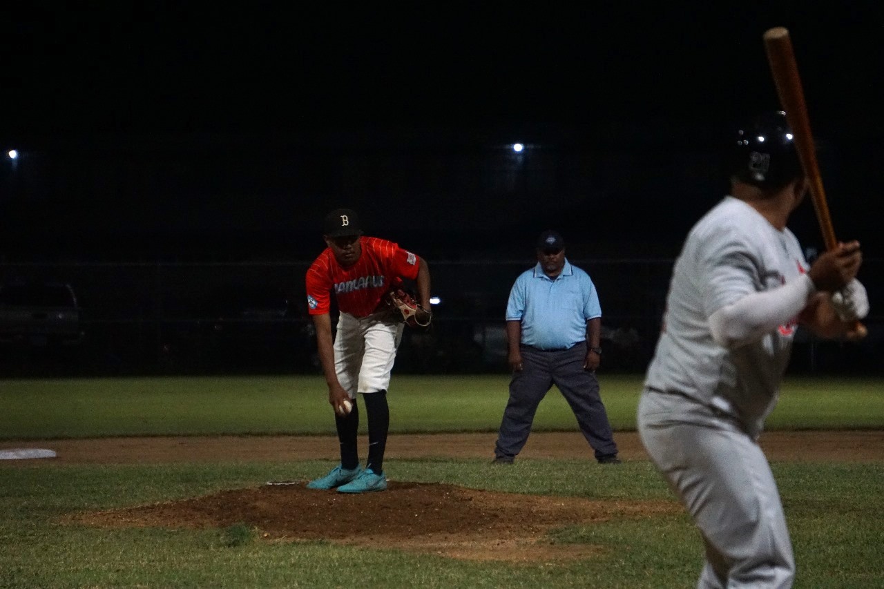 The Falcons' IJ Teigita sets up for the pitch during a 2024 Tan Holdings Baseball League game at the Francisco "Tan Ko" Palacios Baseball Field.