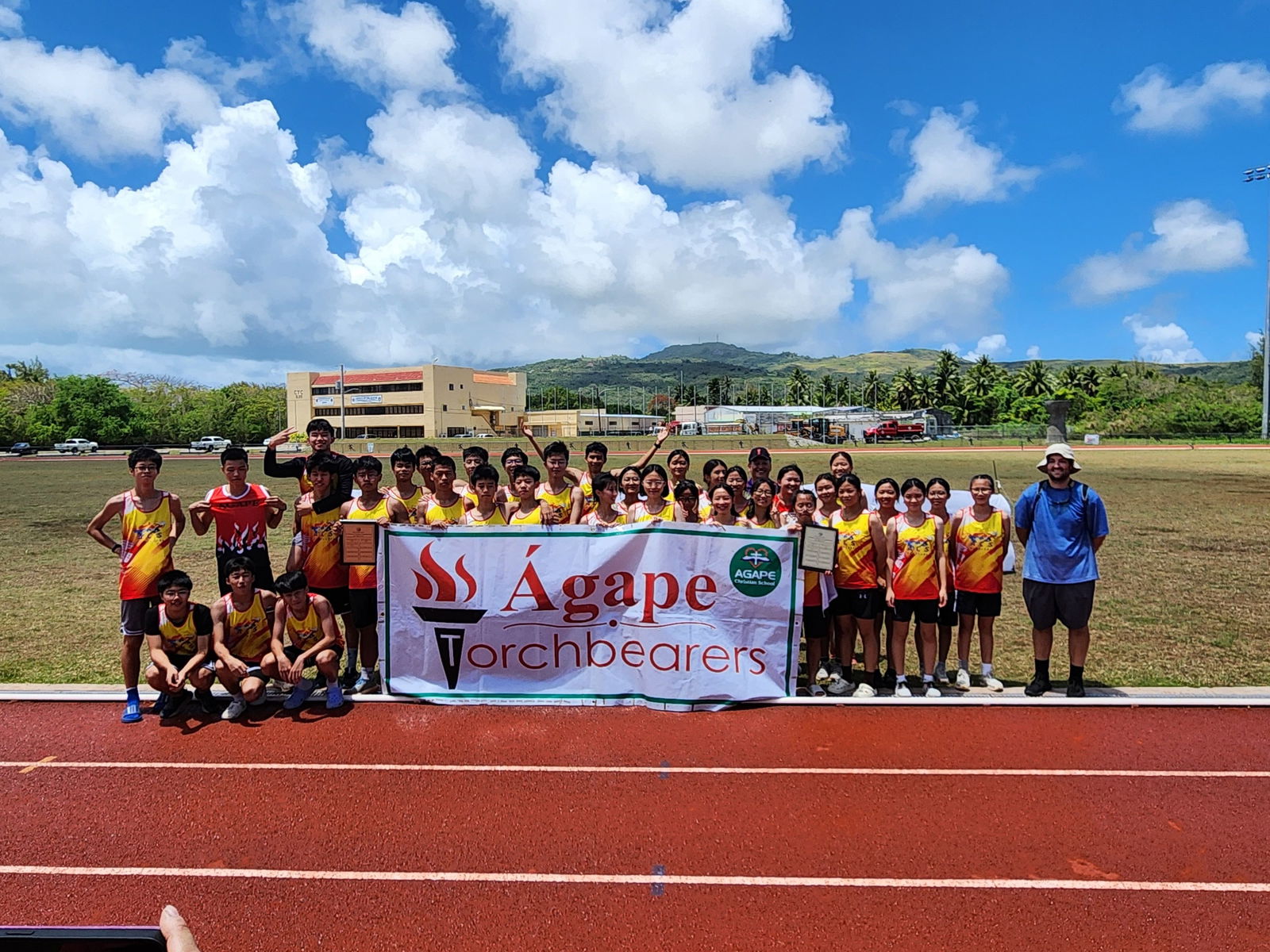 The teams of Agape Christian School pose for a photo during the awards ceremony of the McDonald's-PSS All School Track & Field (Athletics) SY23-24 at the Oleai Sports Complex on Saturday.