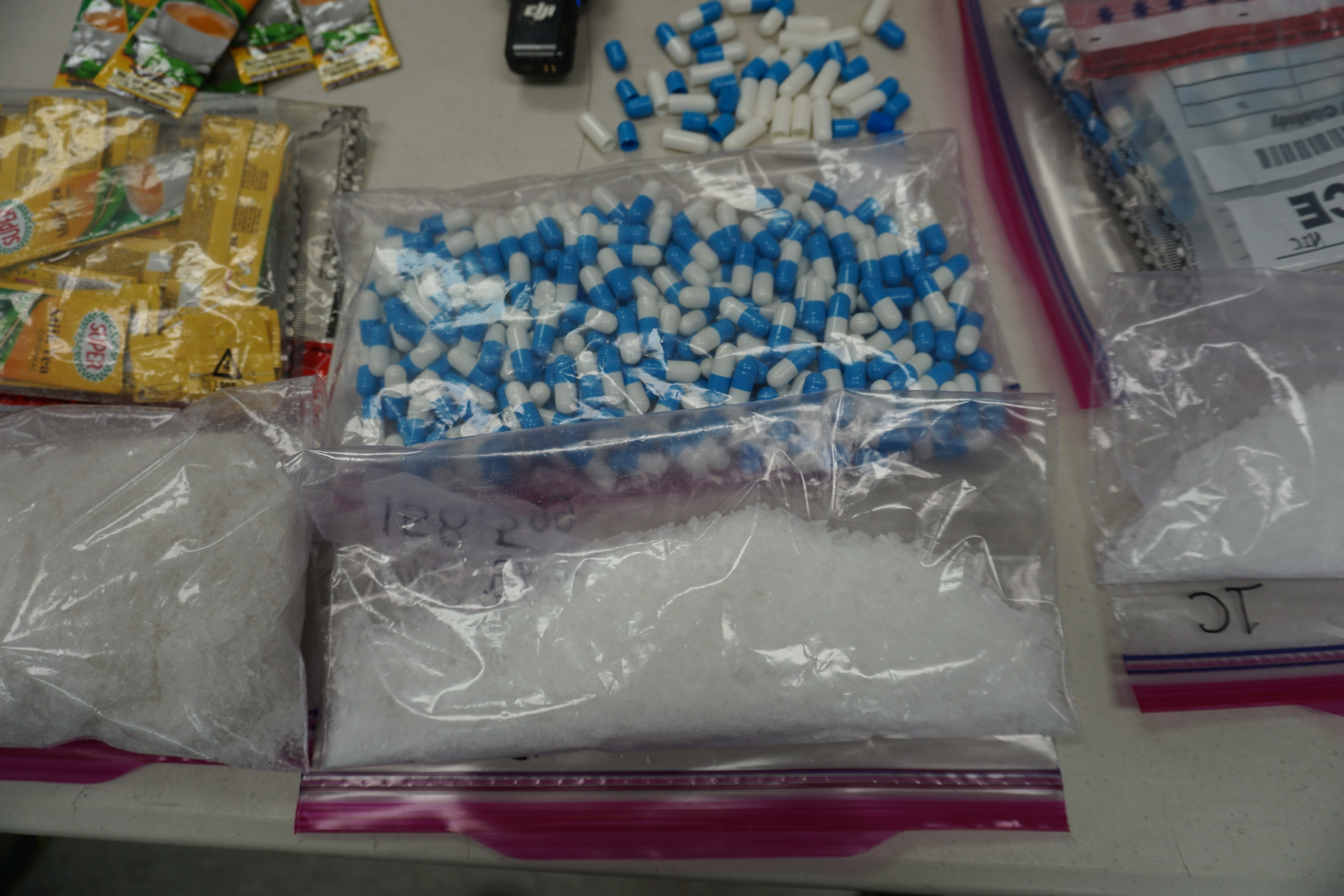 In addition to hiding meth in milk tea packages, drug dealers from California also packed meth into blue and white pills before placing them into men's health multivitamin containers.