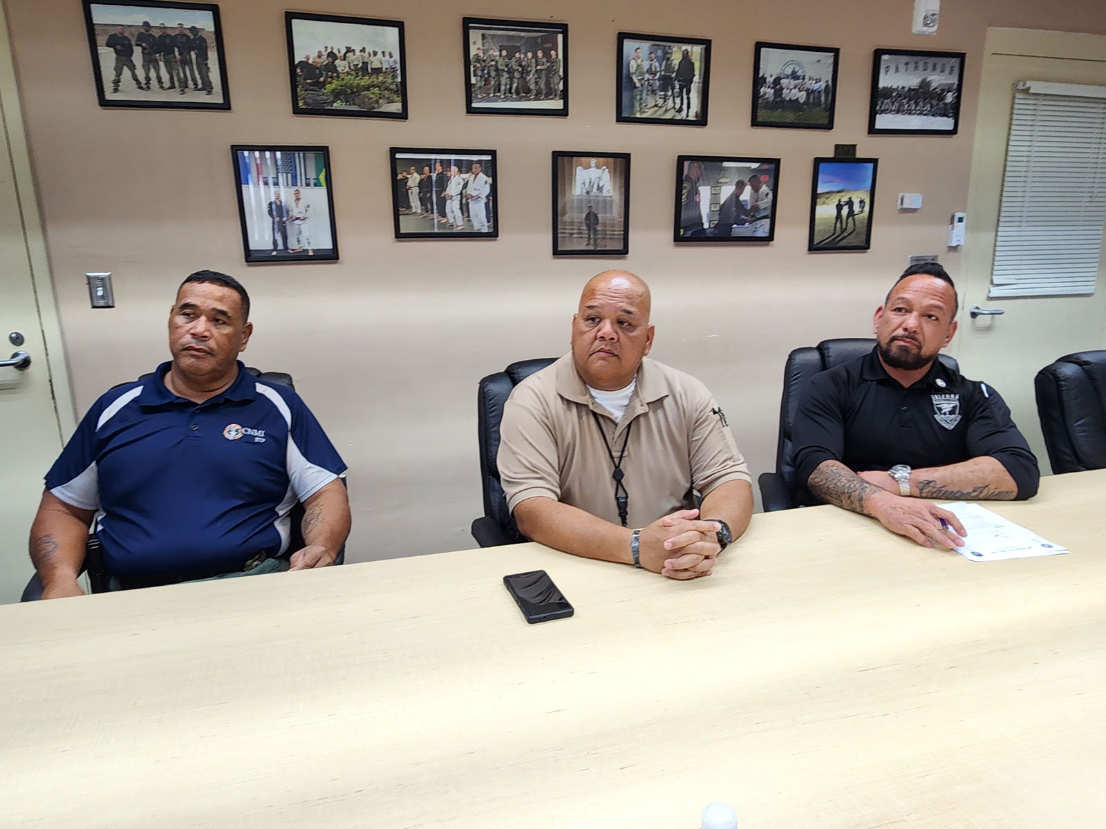 Department of Corrections Commissioner Anthony Torres, right, Department of Public Safety Commissioner Anthony Macaranas, center, and DPS-Special Operations Group Commander Joe Saures conduct a press conference Wednesday afternoon.