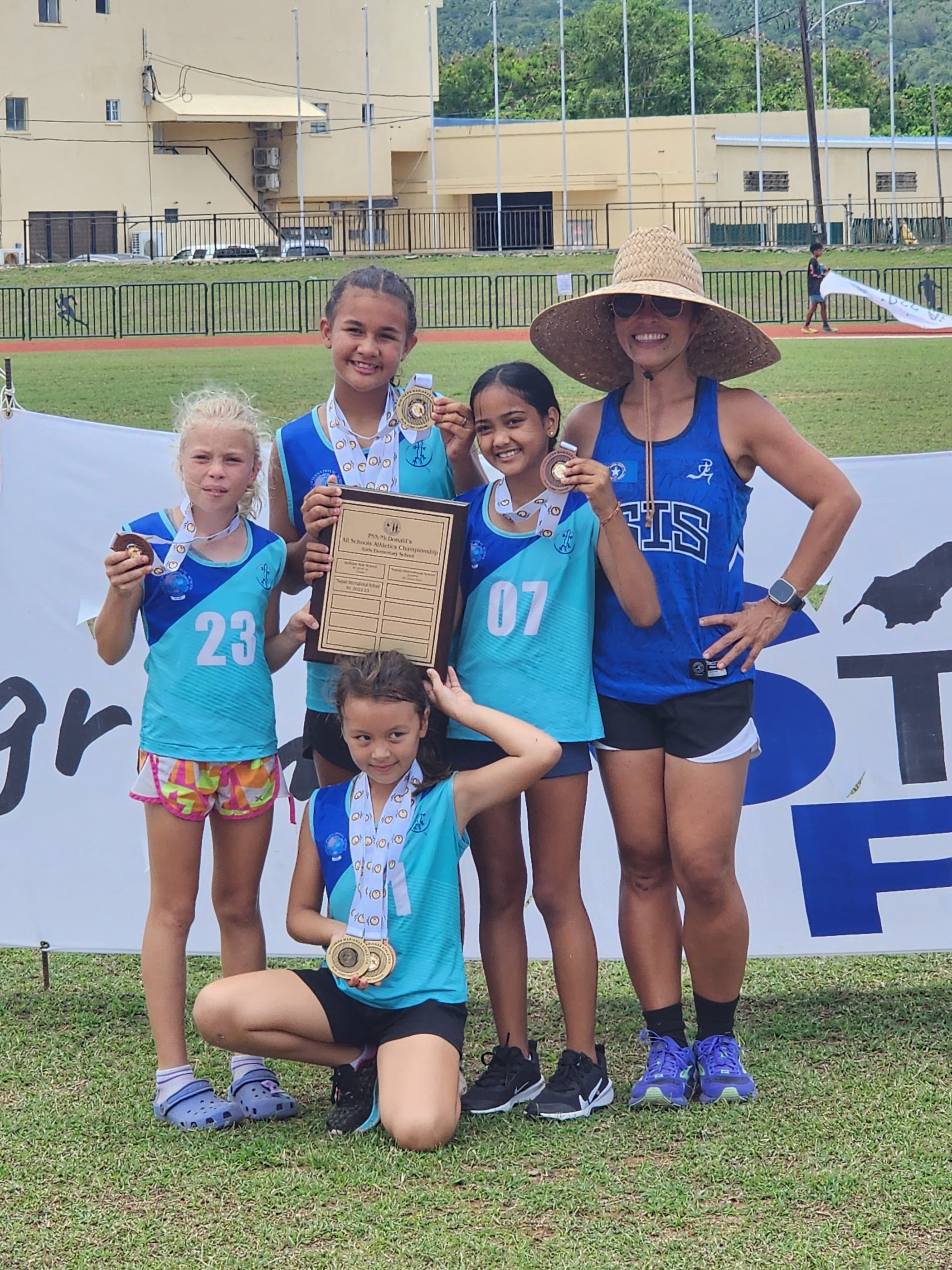 Saipan International School athletes pose for a photo after winning the overall title in the girls elementary division of the McDonald's-PSS All School Track and Field (Athletics) SY23-24 at the Oleai Sports Complex on Saturday