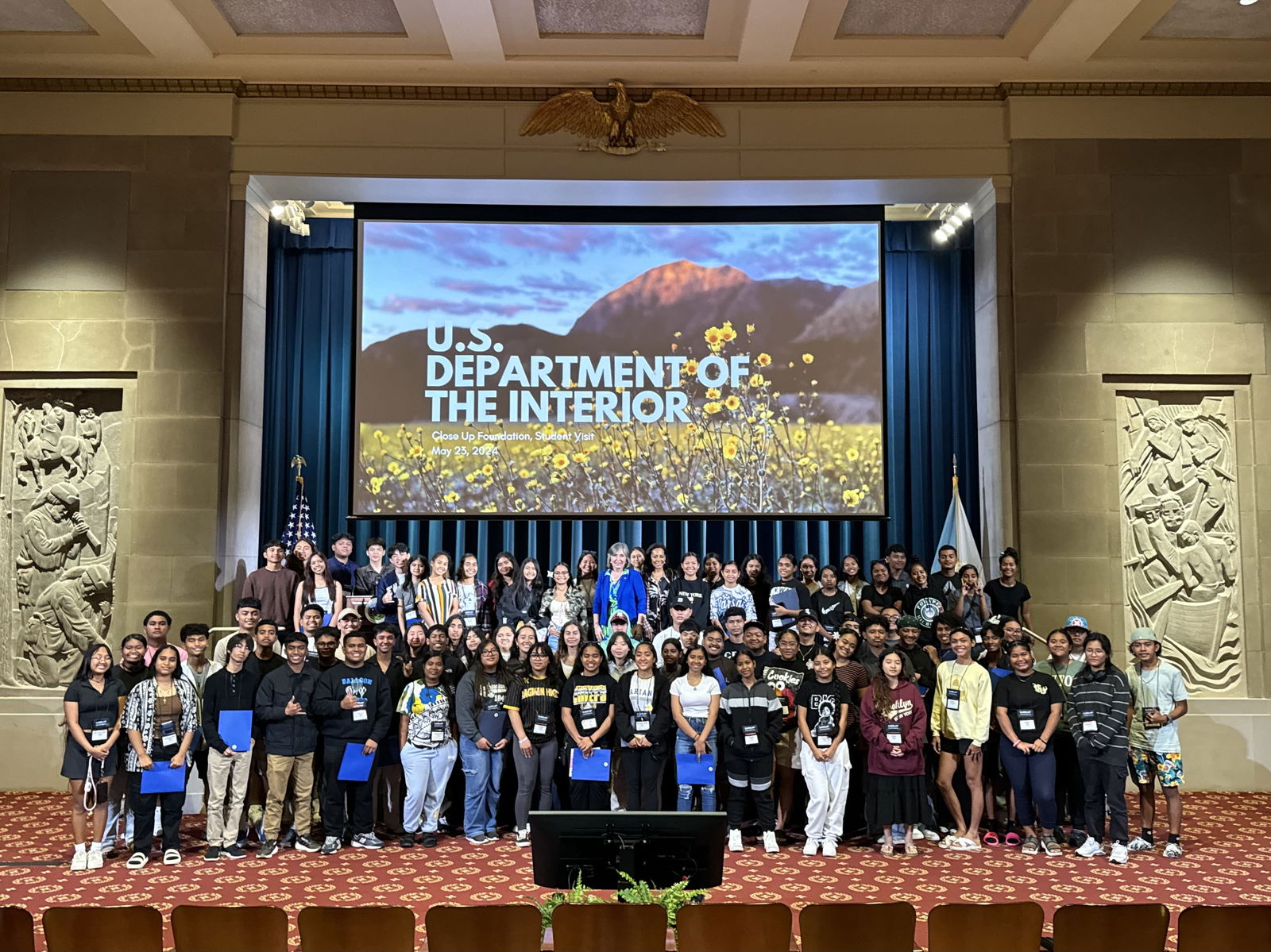 Assistant Secretary for Insular and International Affairs Carmen G. Cantor poses for a photo with high school students from the 2024 Insular Area Close Up Program.