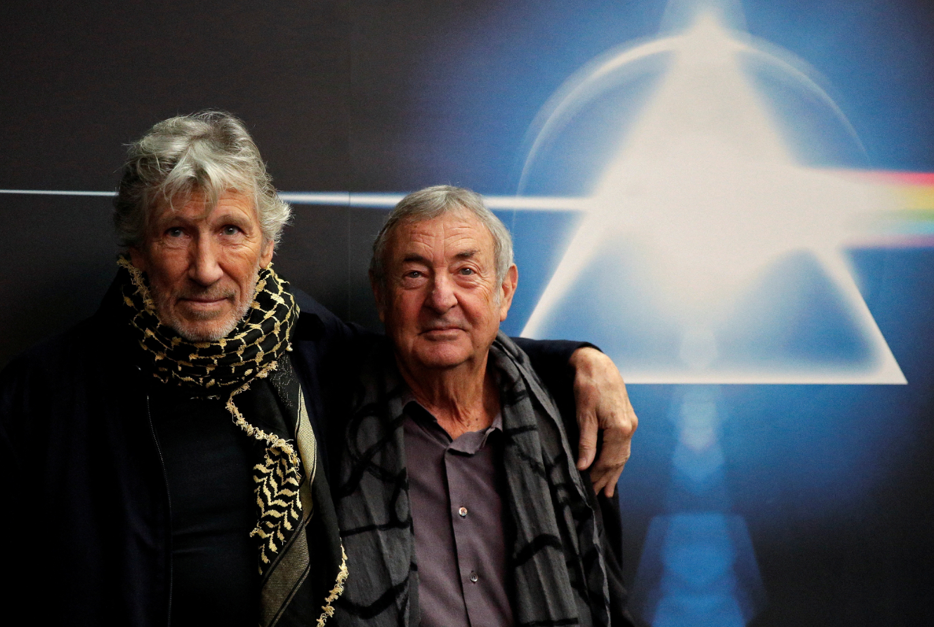Band members Roger Waters, left, and Nick Mason pose before the unveiling of "The Pink Floyd Exhibition: Their Mortal Remains" at the Macro Museum in Rome, Italy Jan. 16, 2018.