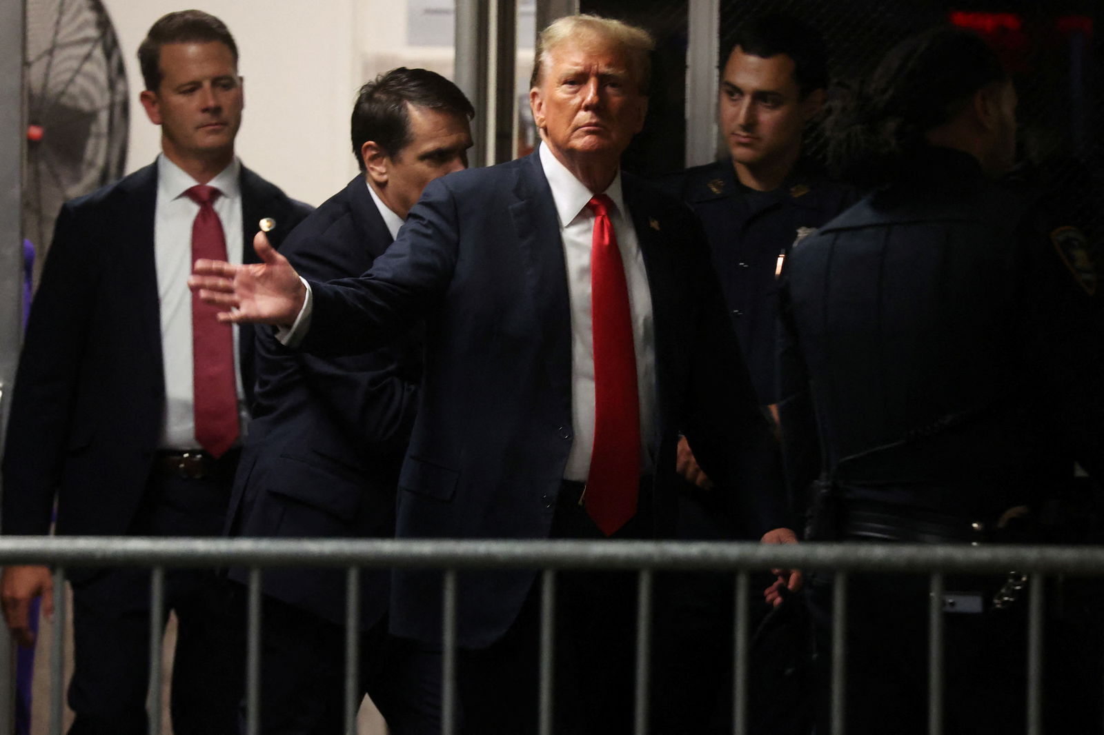 Former President Donald Trump returns after a break in his criminal trial for allegedly covering up hush money payments at Manhattan Criminal Court on May 28, 2024 in New York City.