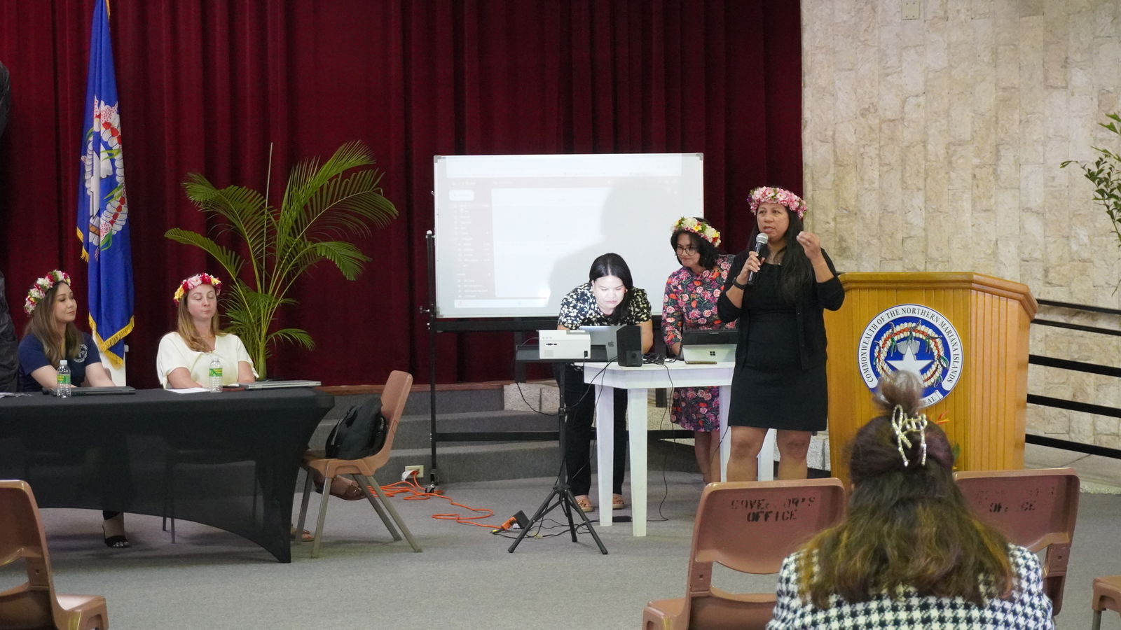 Maise Tenorio delivers a presentation on domestic violence during the 10th Annual CNMI Women's Summit at the multi-purpose center.