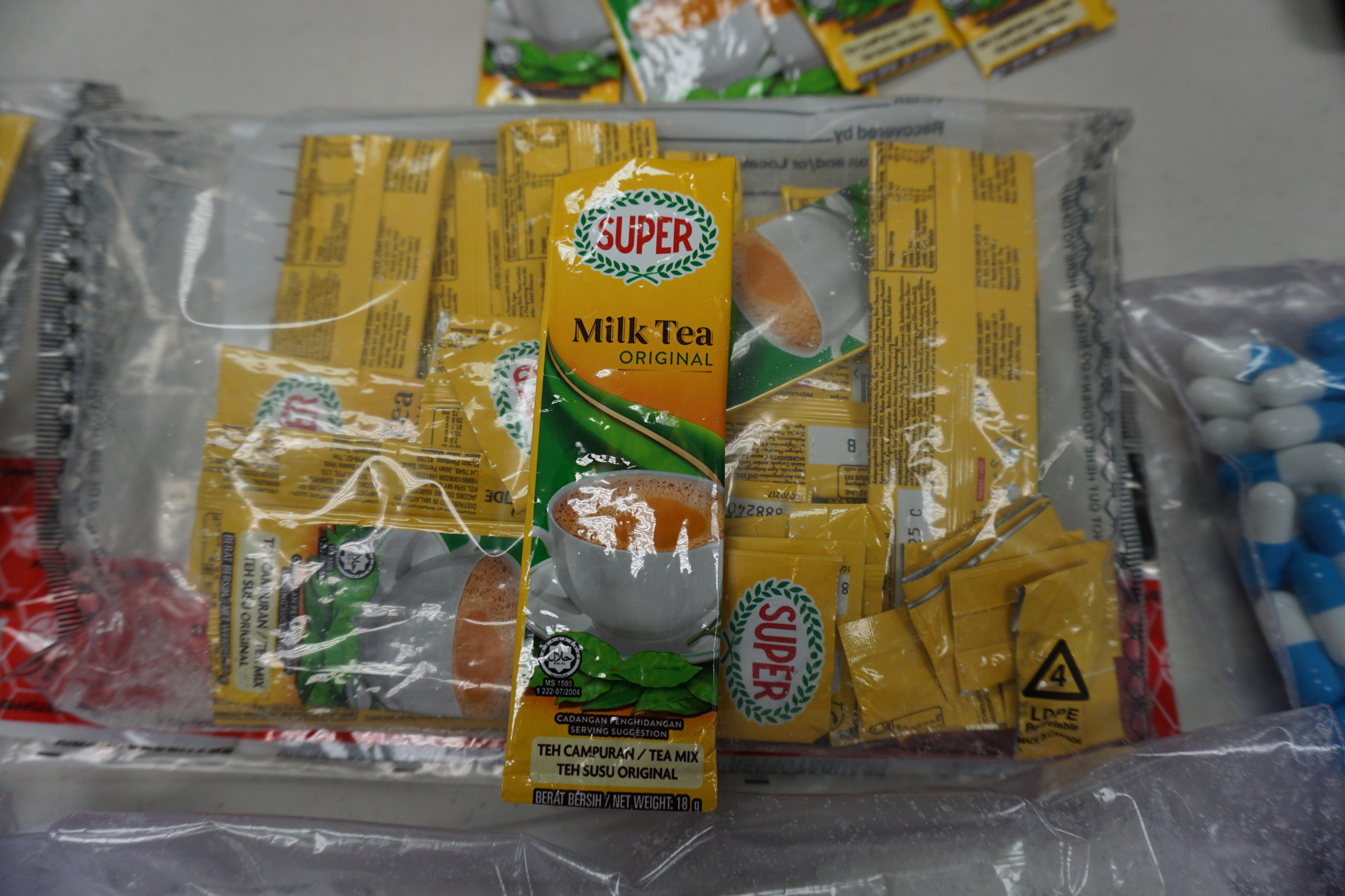 A customs officer became suspicious of instant milk tea packages that arrived on a May 14 air cargo shipment. This led to the discovery of 2.9 lbs of meth.