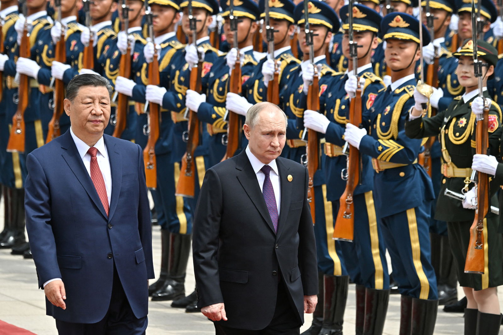 Russian President Vladimir Putin and Chinese President Xi Jinping attend an official welcoming ceremony in Beijing, China, May 16, 2024.