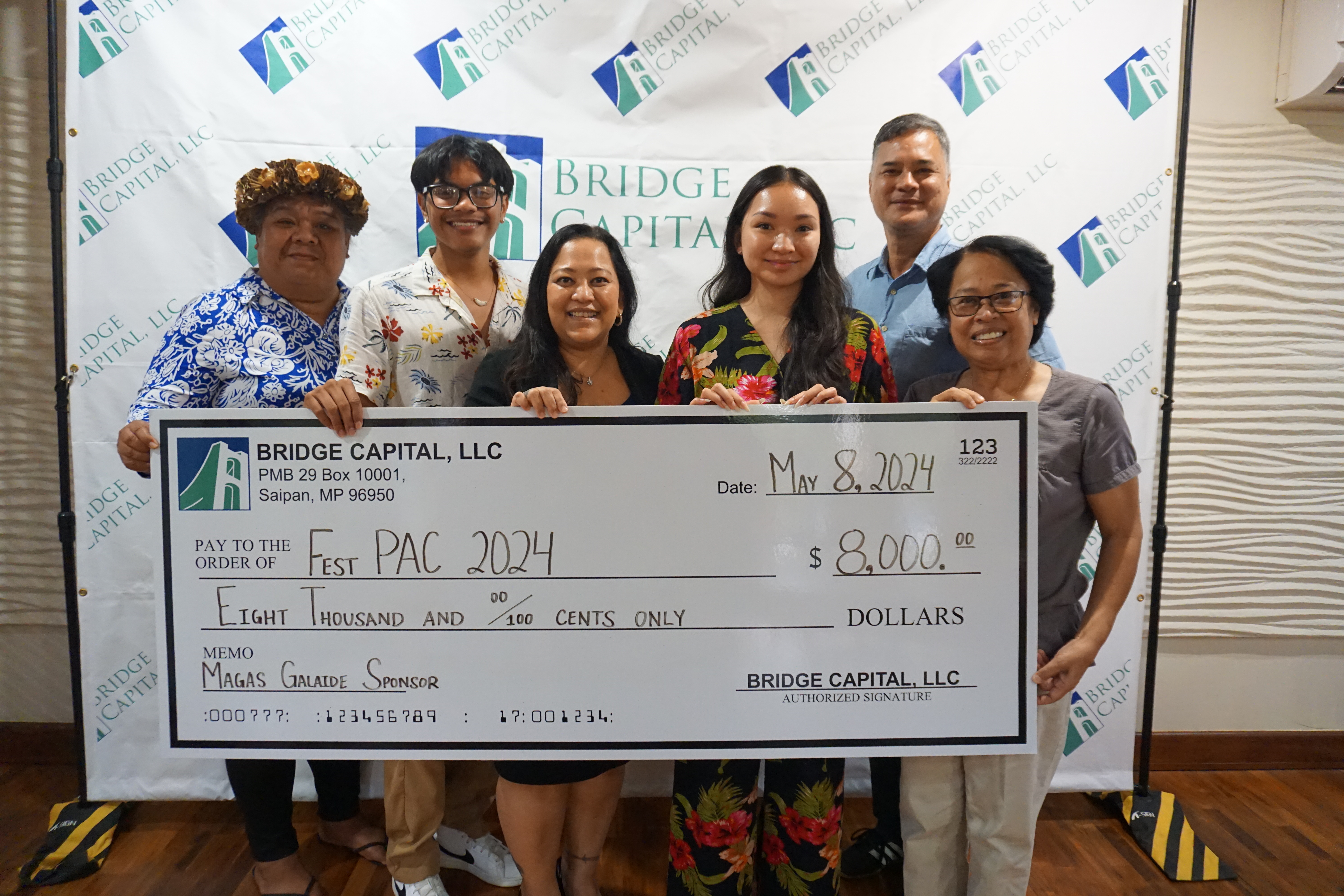 Bridge Capital LLC is a Må’gas Galaide-level sponsor of the CNMI’s delegation to the 2024 Festival of Pacific Arts and Culture. From left, Gloriana Teuira, Jude Litulumar, Julie Duenas, Shannon Sasamoto, Alex Palacios and Maggie Sablan.