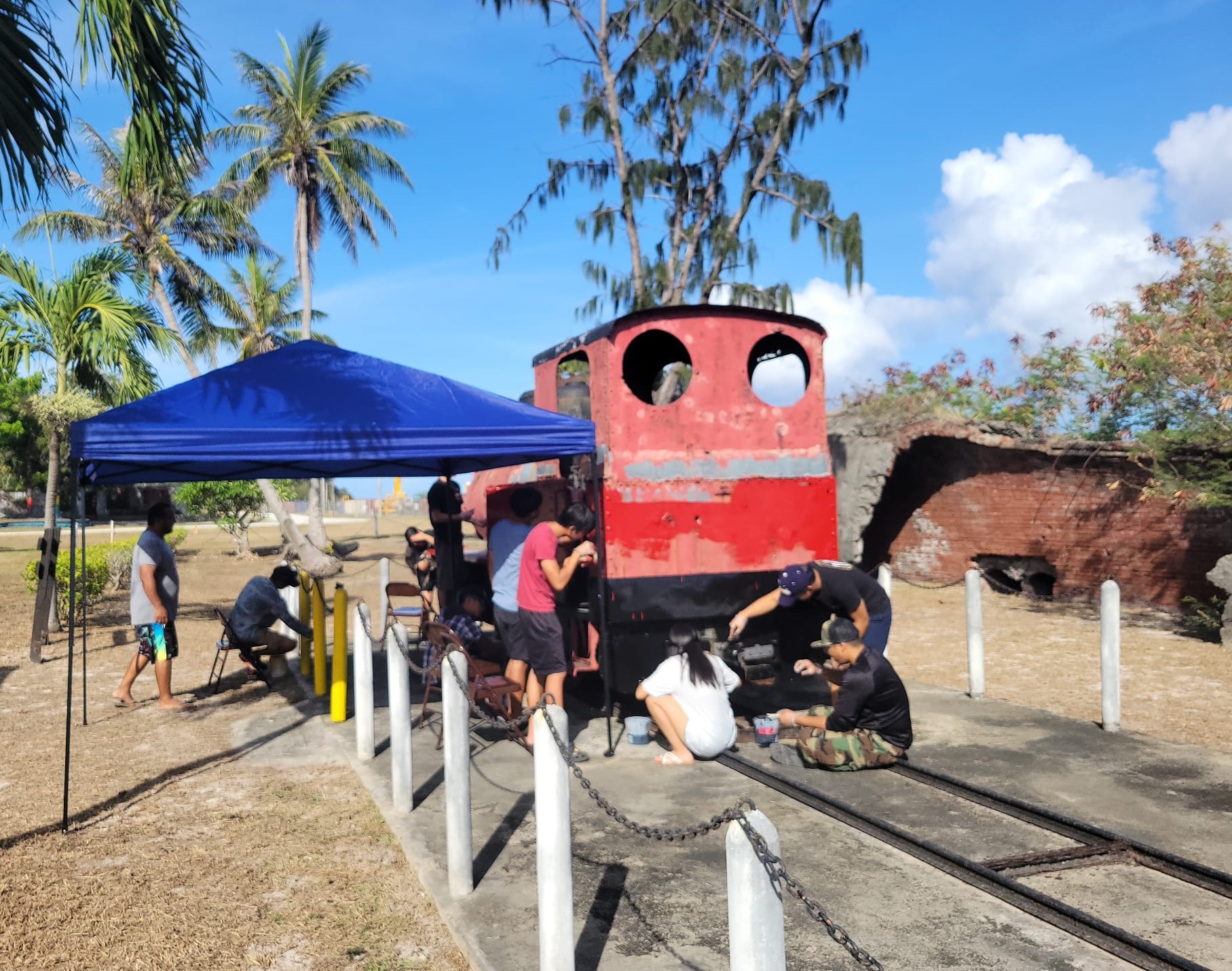 Students of the National Honor Society of Dr. Rita H. Inos Jr./Sr. High School in Rota mark Marianas Tourism Month by repainting a historic sugar industry train engine dating back to the Japanese administration era in the early 1900s.  The project was undertaken on May 11, 2024 with the Marianas Visitors Authority in celebration of Marianas Tourism Month.