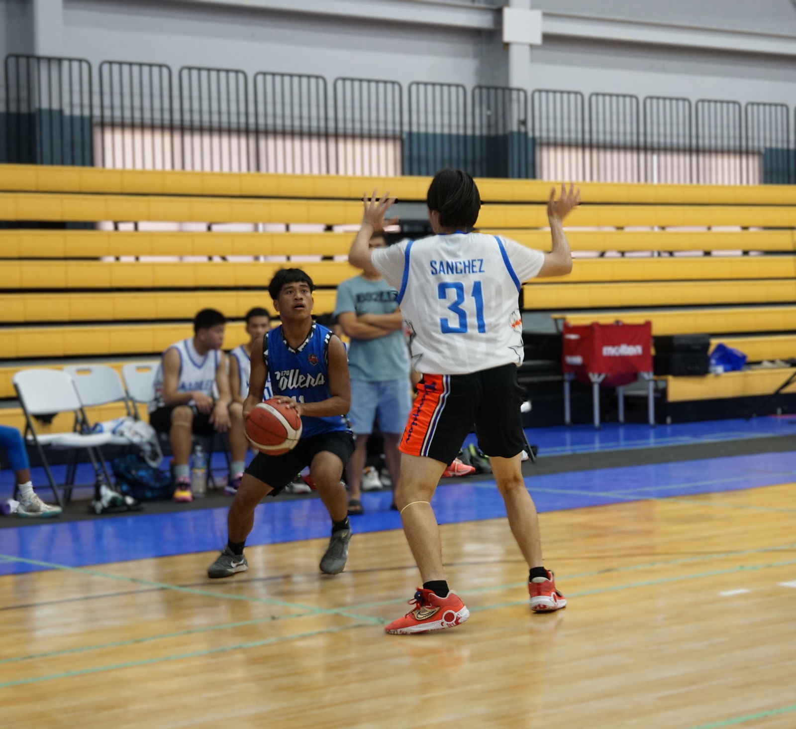 Heman Addy of the 670 Rollers gathers for the three-point shot against Madflex in a Pokka Cup 2024 game at the Ada gym.