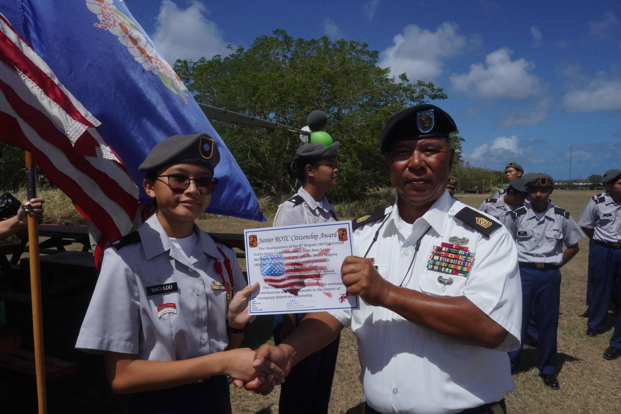 C/2LT Baculod, Miyiel receives a Citizenship Award certificate during the awards ceremony.