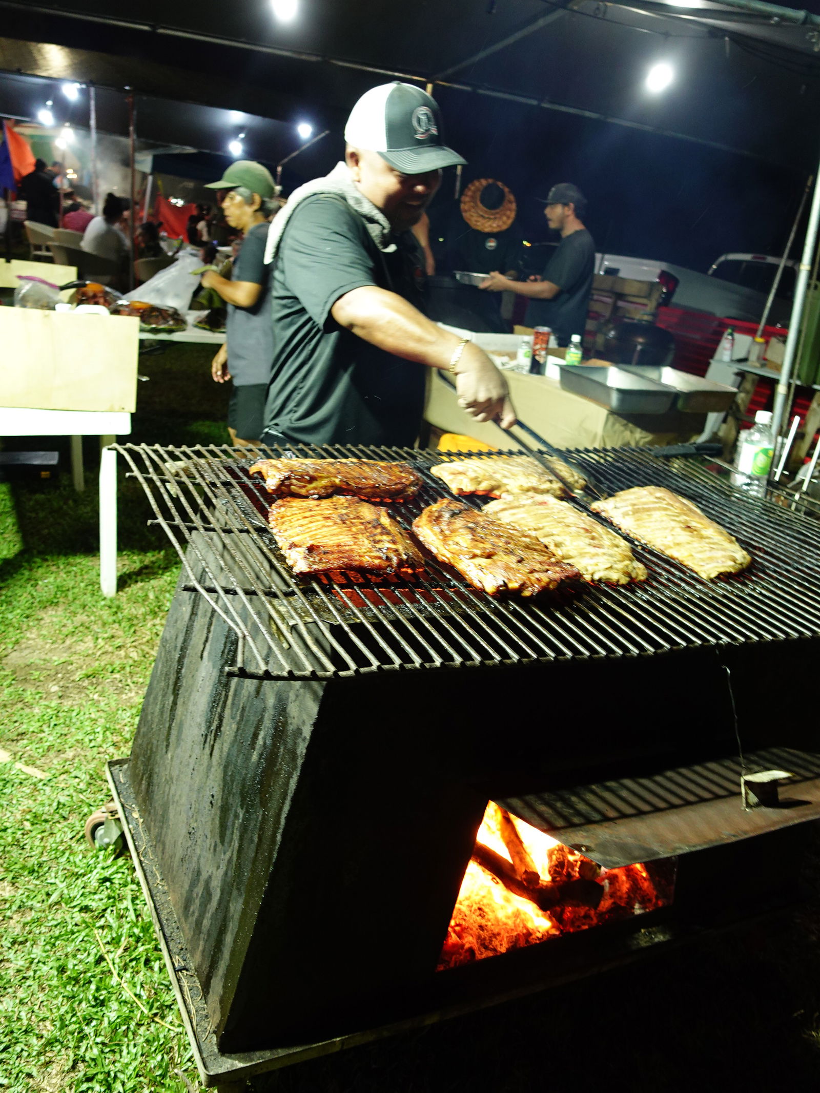 Oh My Grill (OMG) prepares ribs for the international food challenge held at the Taste of the Marianas International Food Festival on May 11, 2024, at American Memorial Park in Garapan, Saipan.