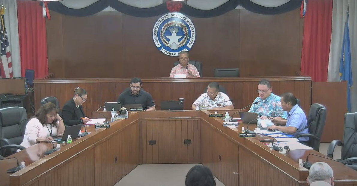 Sen. Paul A. Manglona, center background, presides over a public hearing conducted by the Senate Committee on Public Utilities, Transportation and Communications, which he chairs, on Wednesday in the Senate chamber.