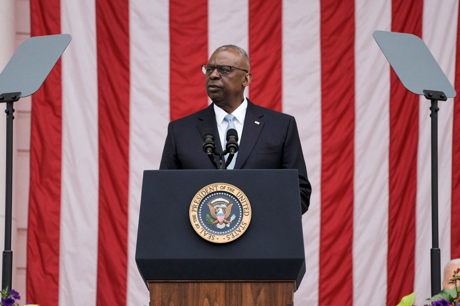Secretary of Defense Lloyd Austin speaks during the National Memorial Day Wreath-Laying and Observance Ceremony at Arlington National Cemetery, in Arlington, Virginia, May 27, 2024.