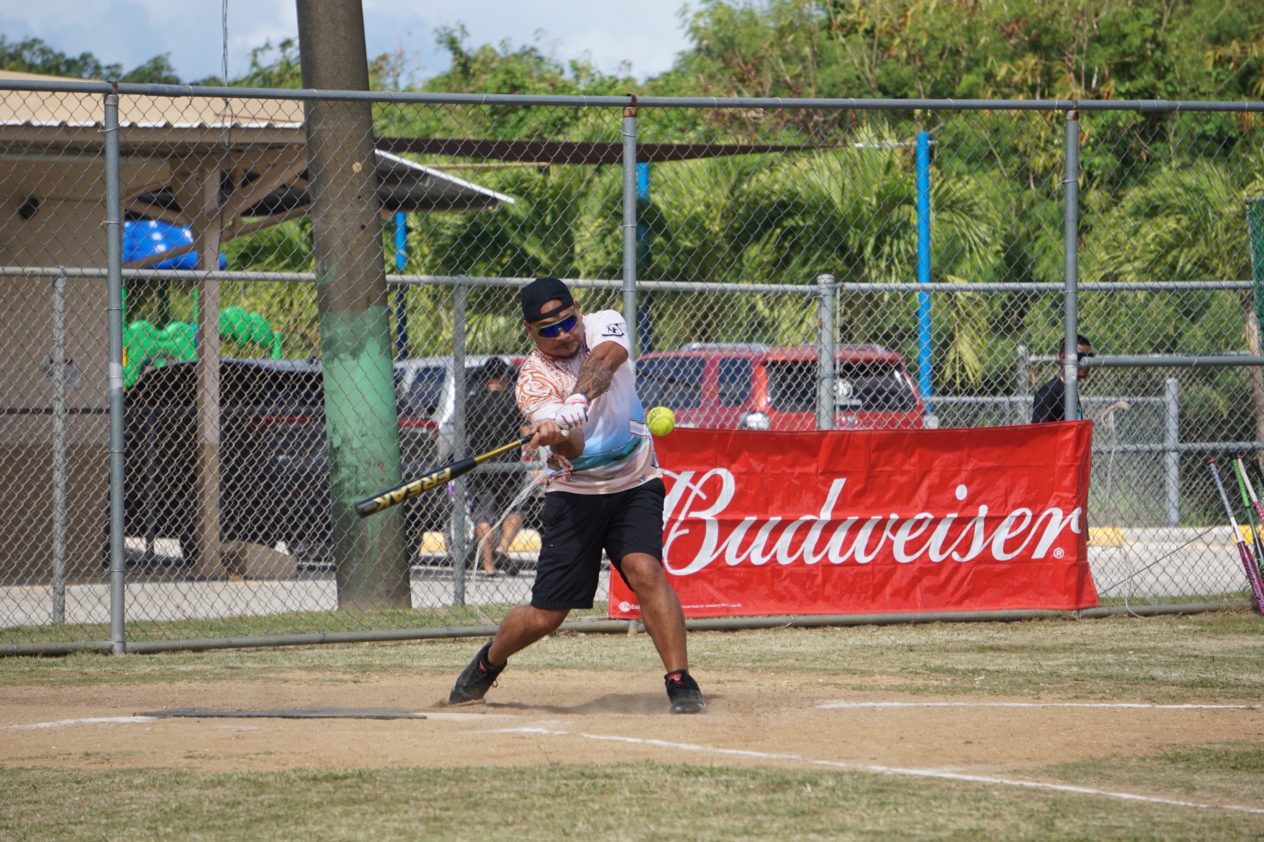 A TutuRamz batter is about to connect a double during a game of the 2024 Budweiser Belau Amateur Softball Association League at the Dandan Baseball Field.